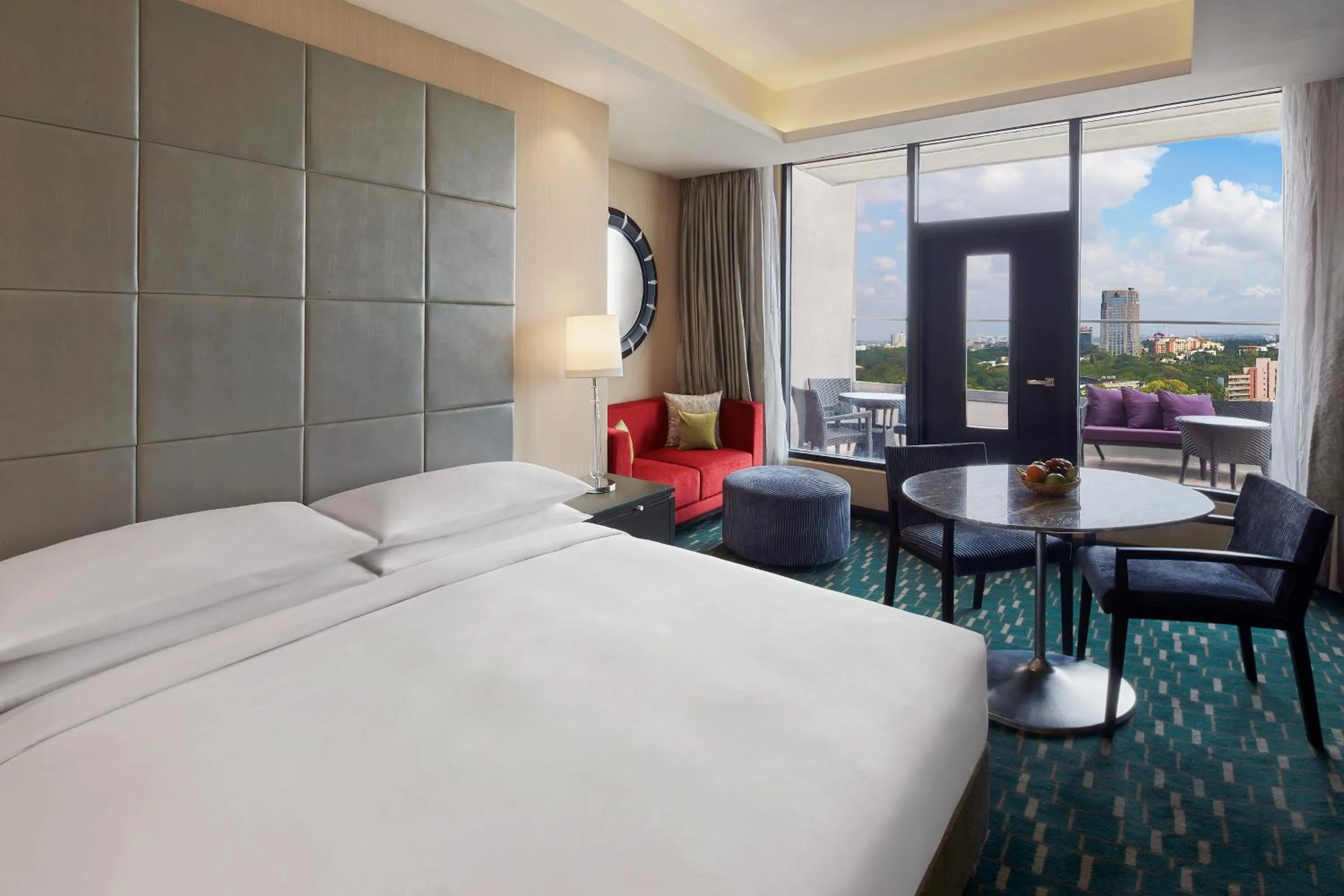 Patio, Bed in Renaissance Bengaluru Race Course Hotel