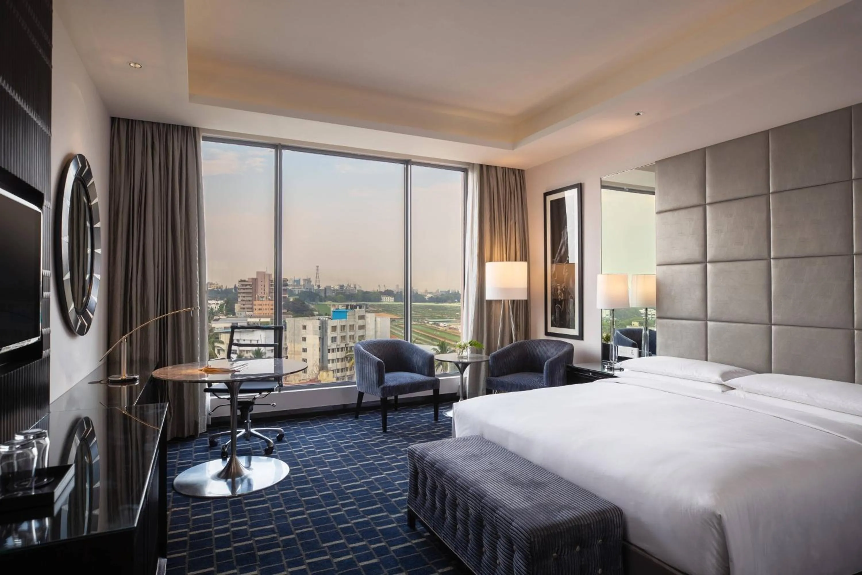 Photo of the whole room, Bed in Renaissance Bengaluru Race Course Hotel