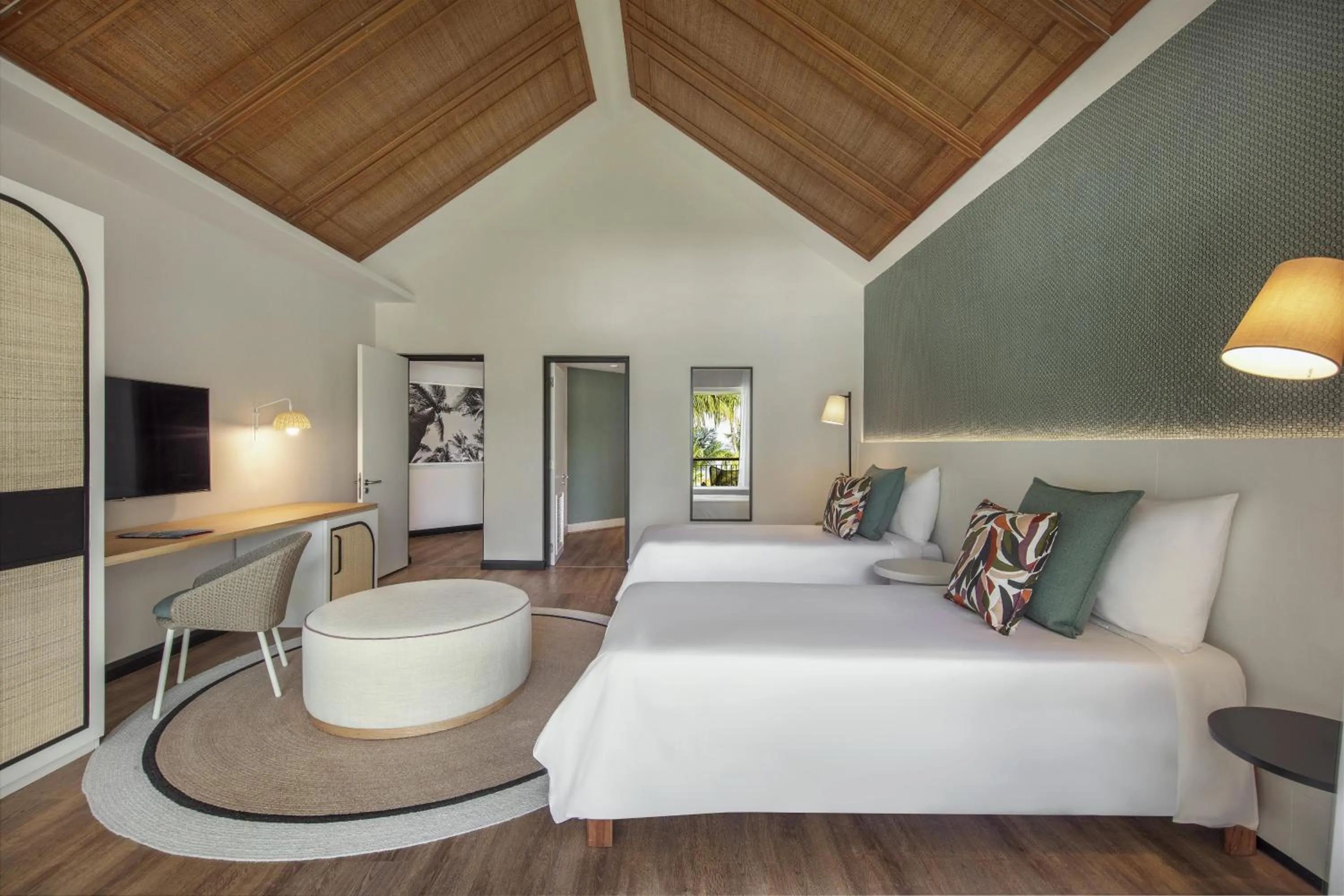 Bed in Victoria Beachcomber Resort & Spa