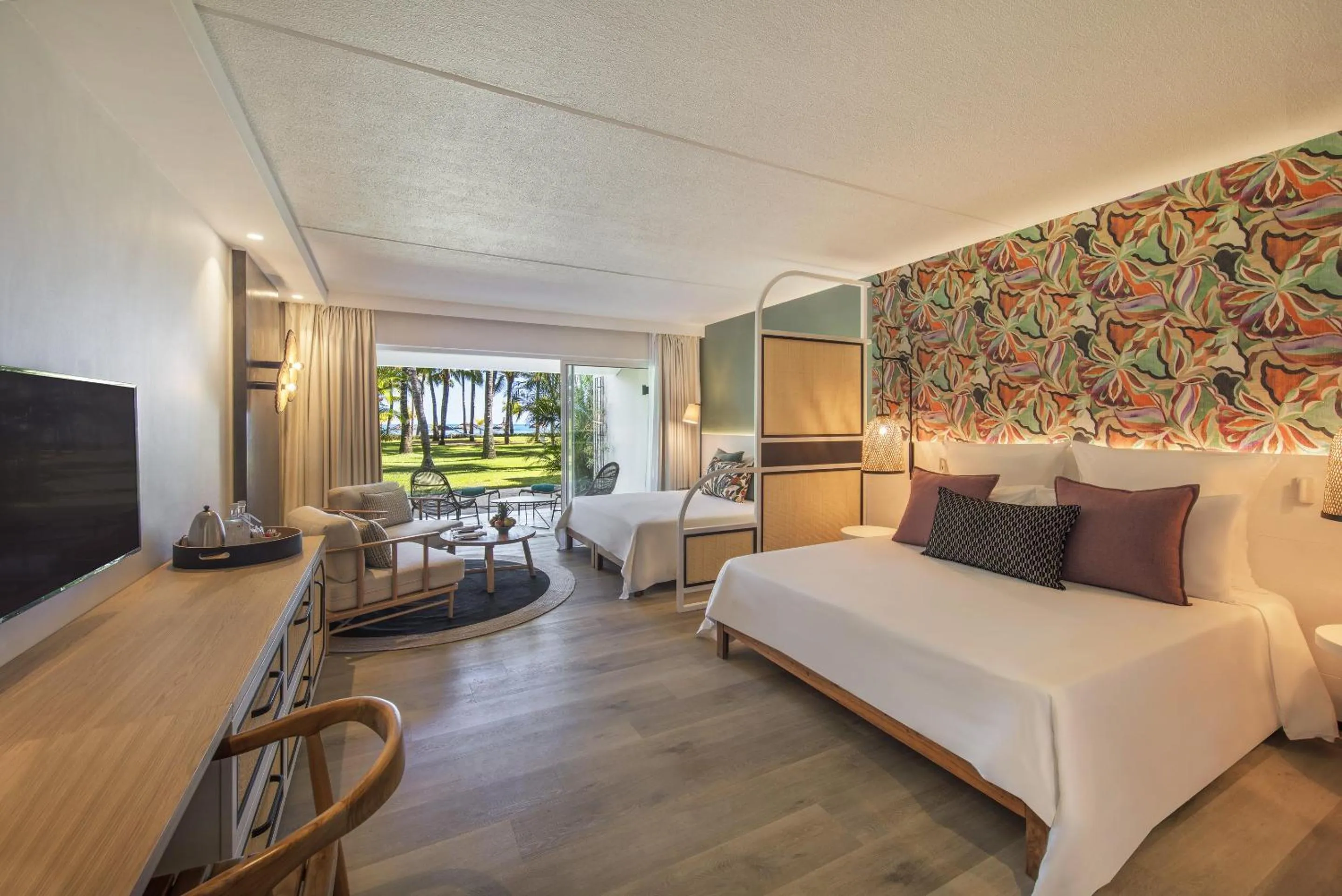 Bed in Victoria Beachcomber Resort & Spa