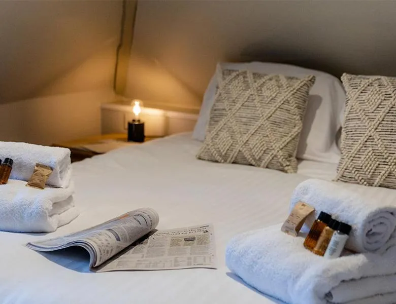 Bed in The Bell Inn Hotel