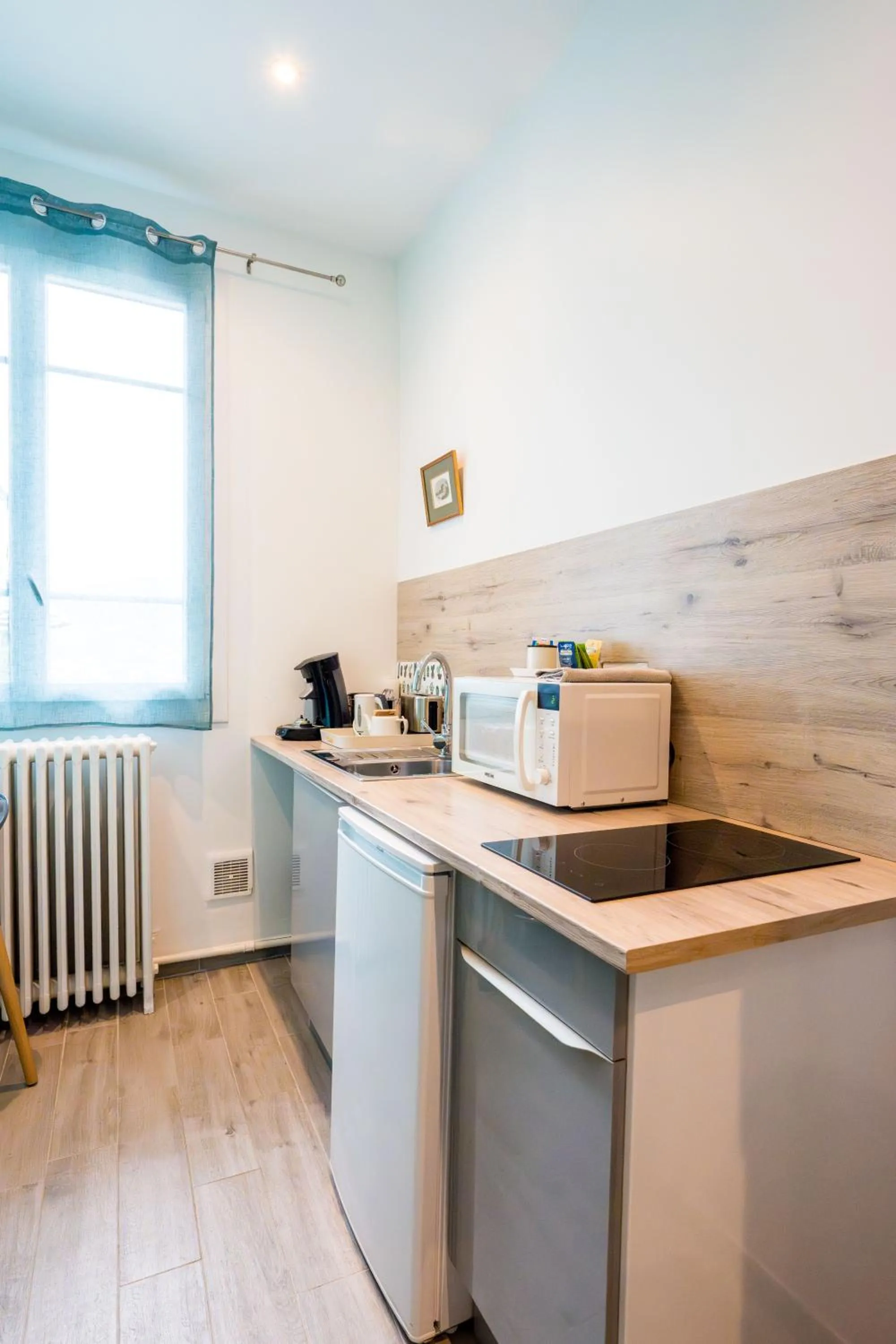 Kitchen or kitchenette in La Maison Jaffran, suite en ville