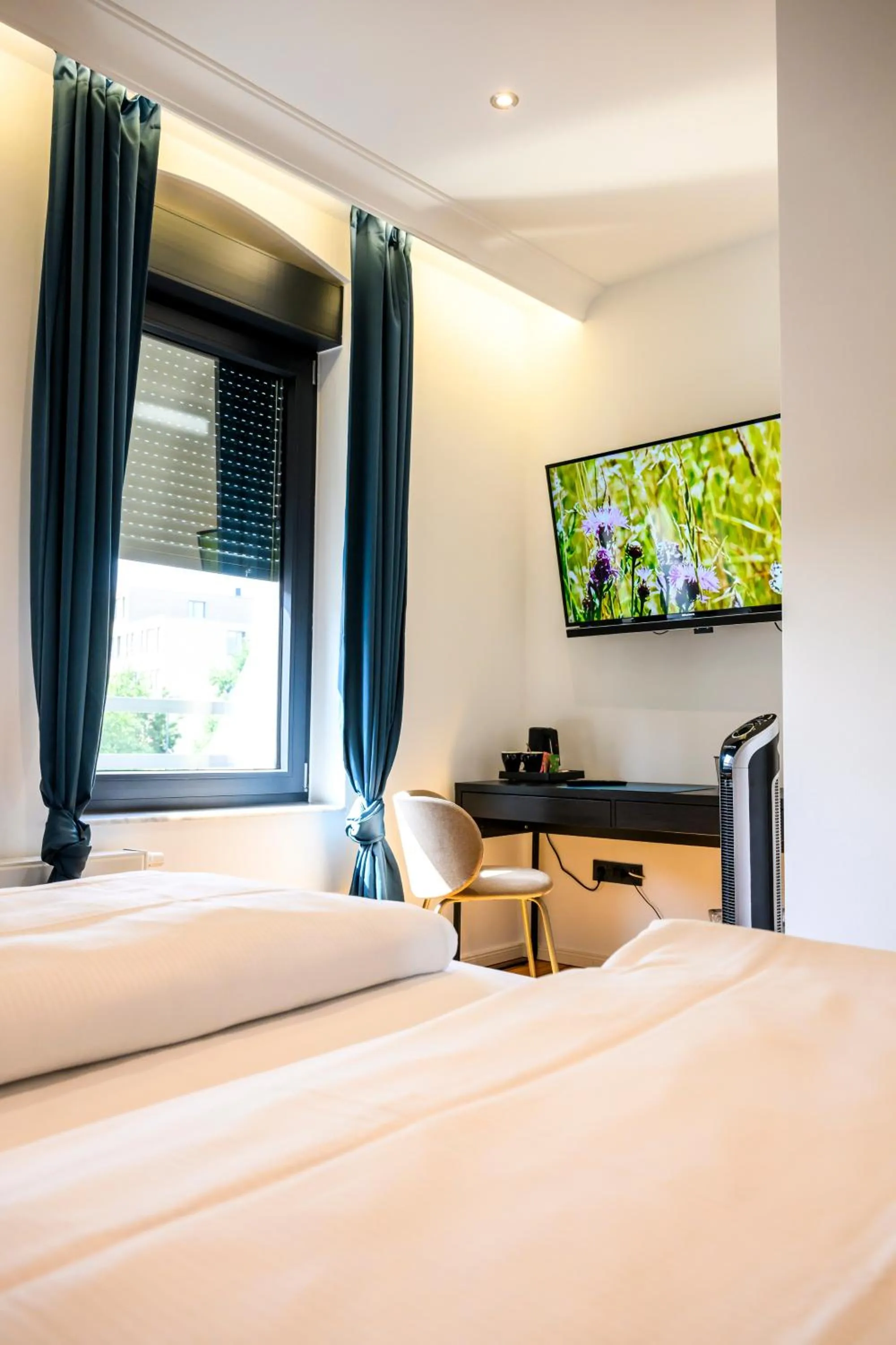 Bed in Nikii Boutique Hotel