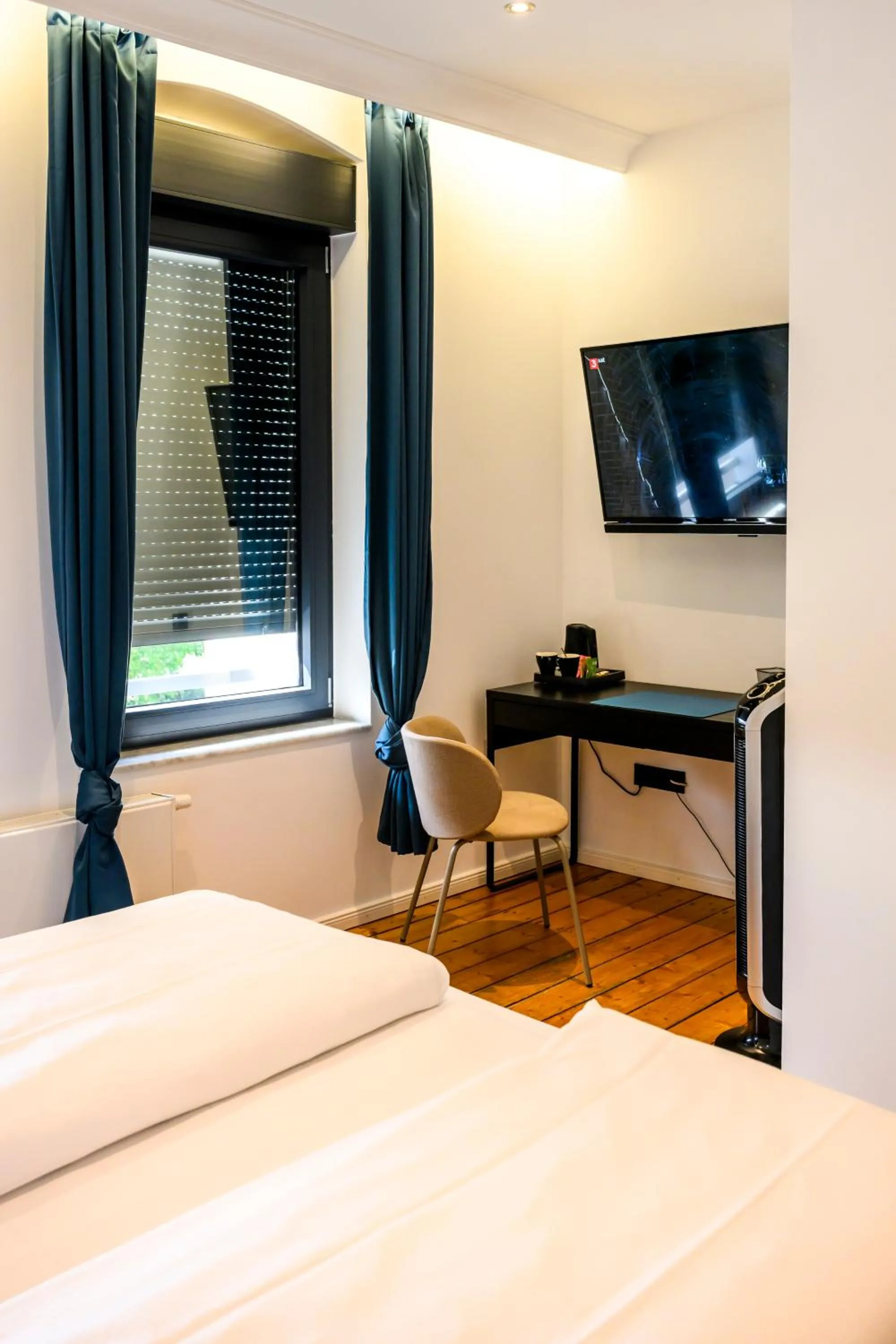 Bed in Nikii Boutique Hotel