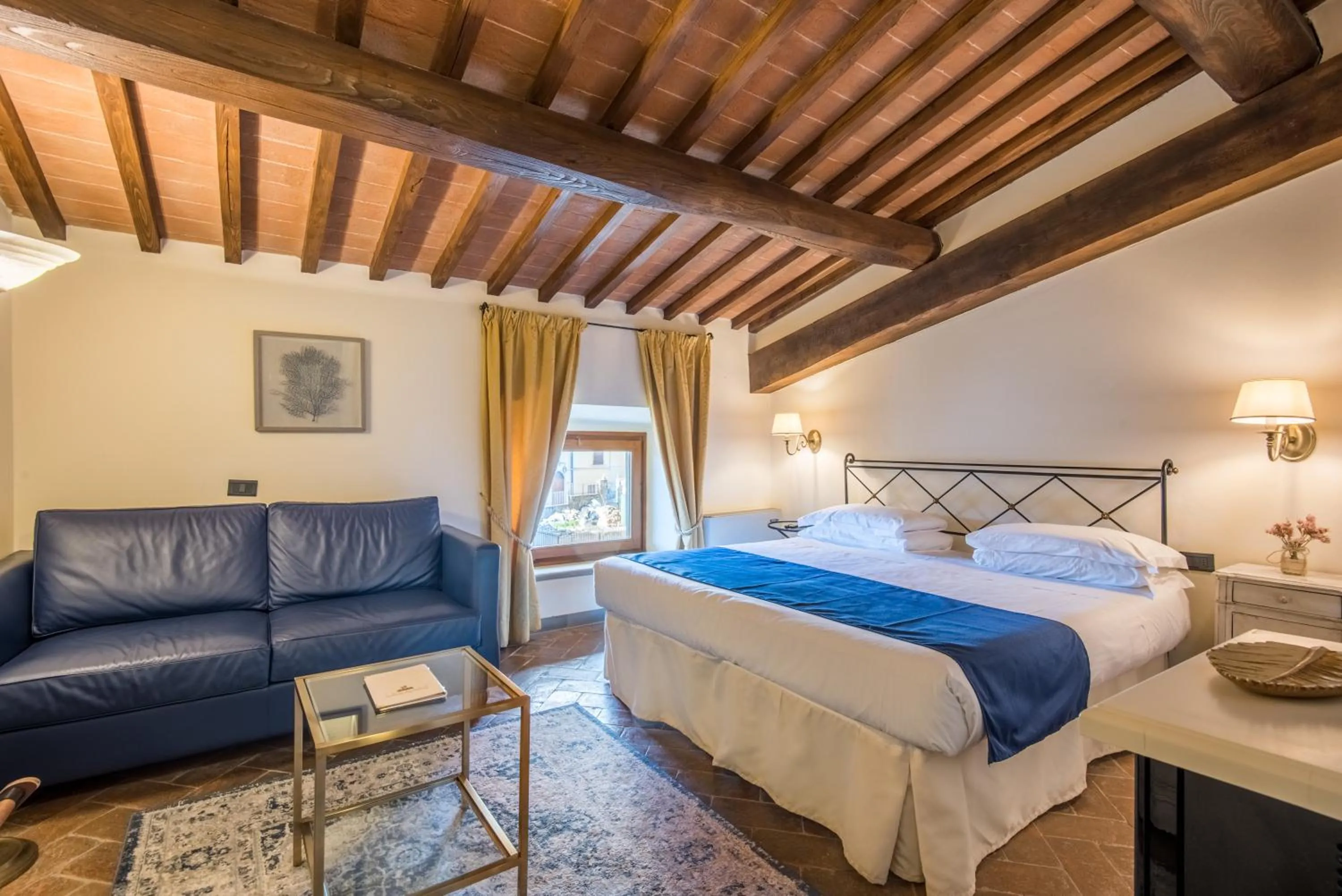 Bed in Hotel Palazzo Squarcialupi