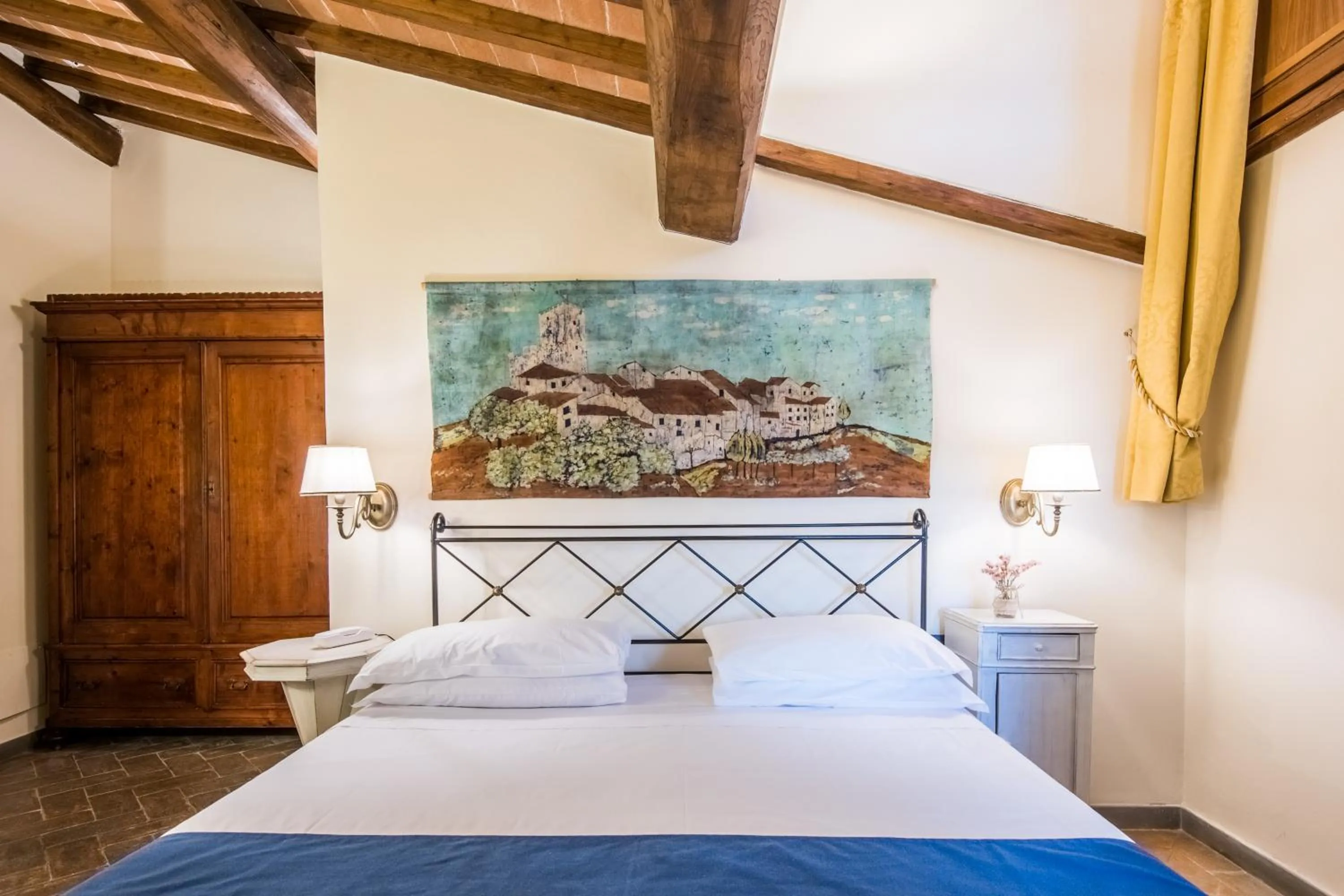 Bed in Hotel Palazzo Squarcialupi