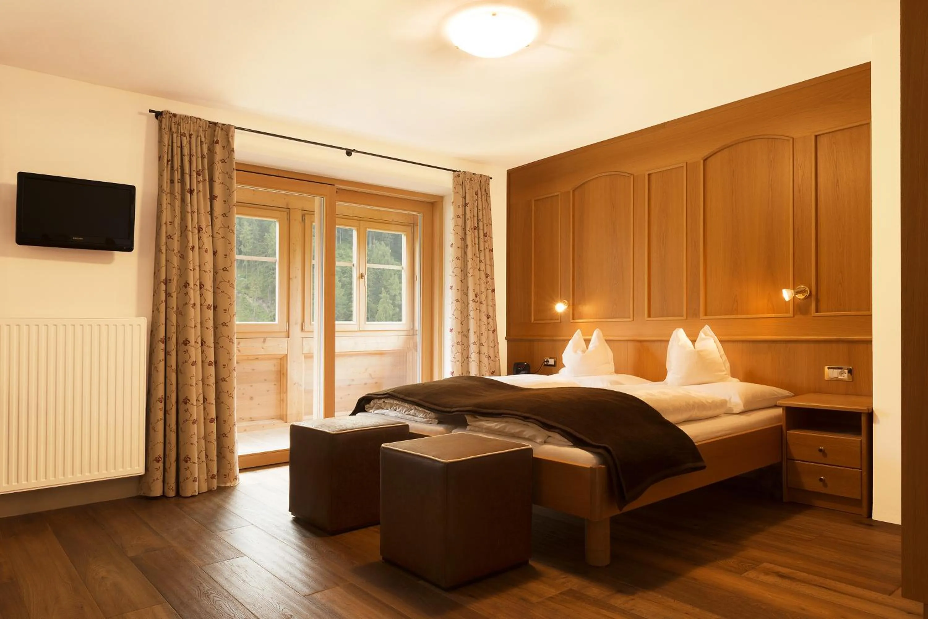 Bed in Garni Hotel Geier