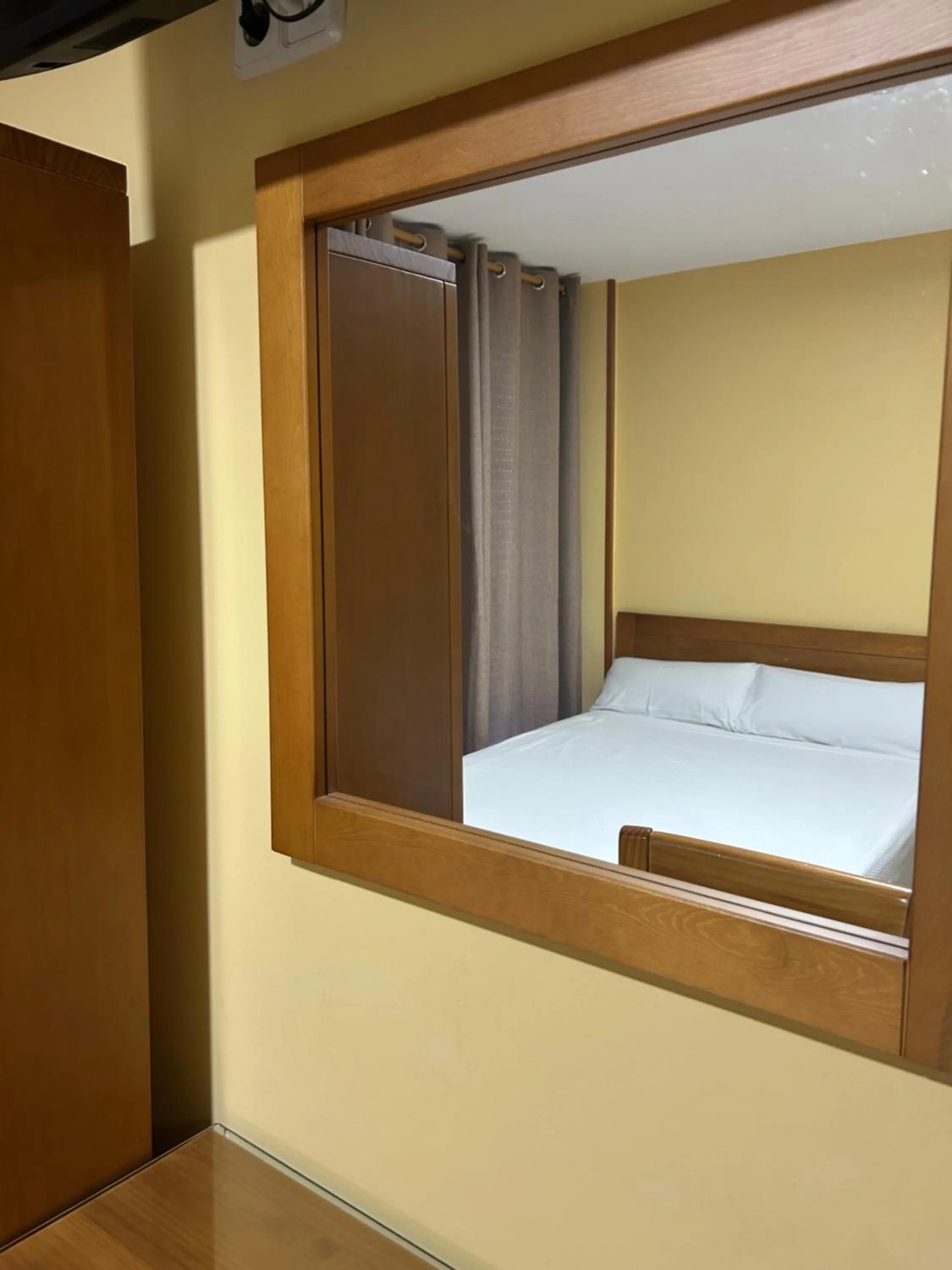 Bed in Hostal Aeropuerto