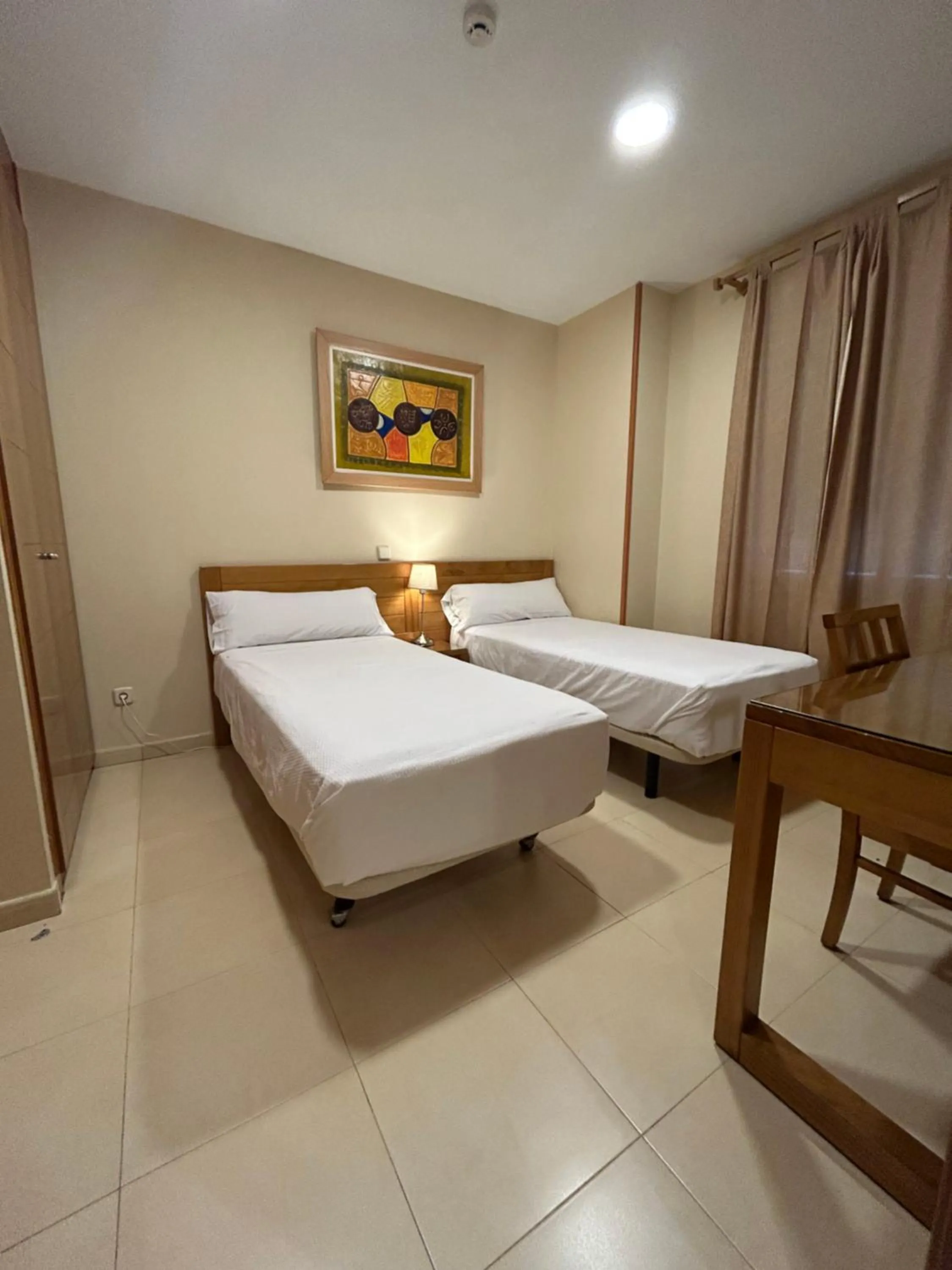 Bed in Hostal Aeropuerto