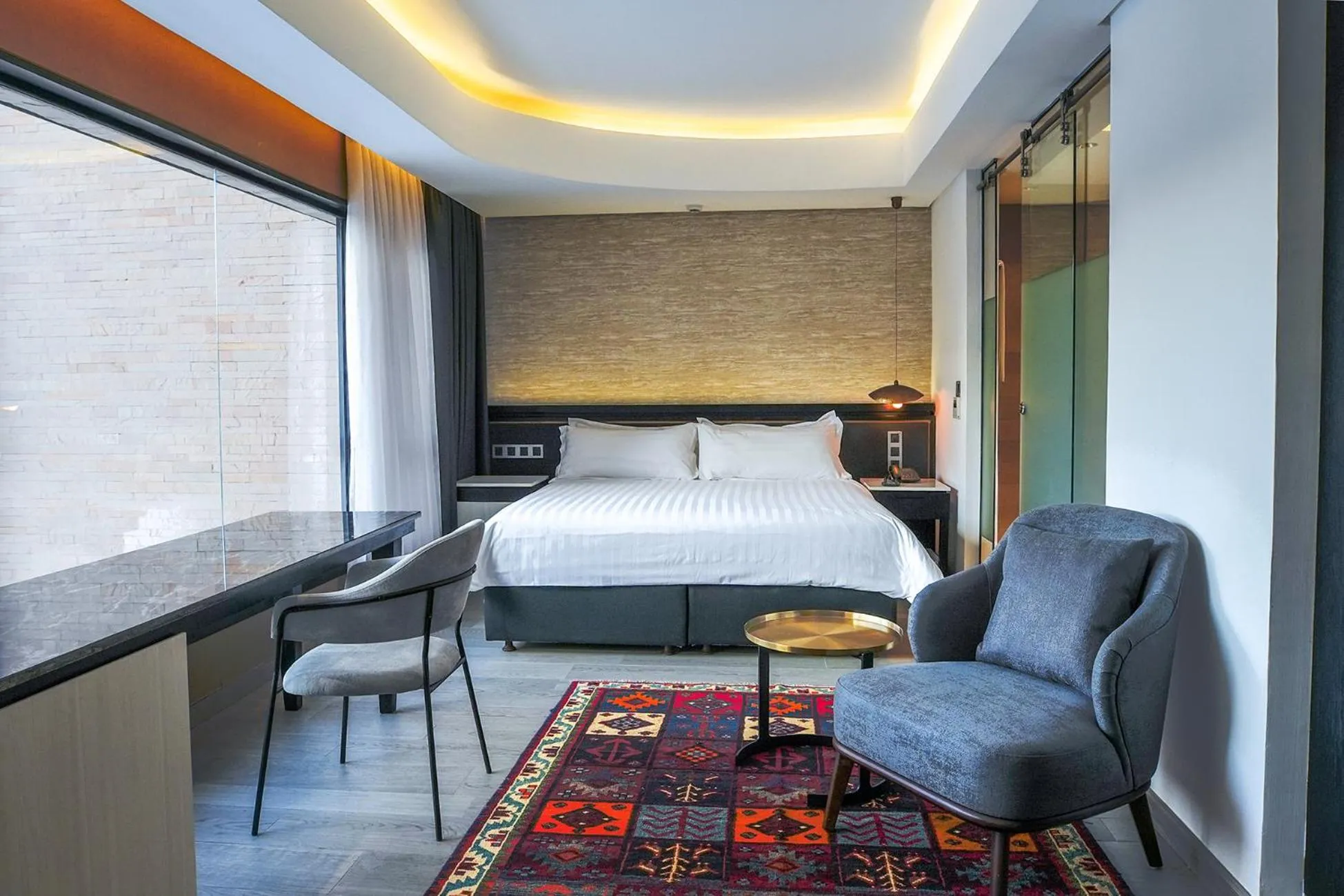 Seating area, Bed in Tribe Hotel, Nairobi, a Member of Design Hotels