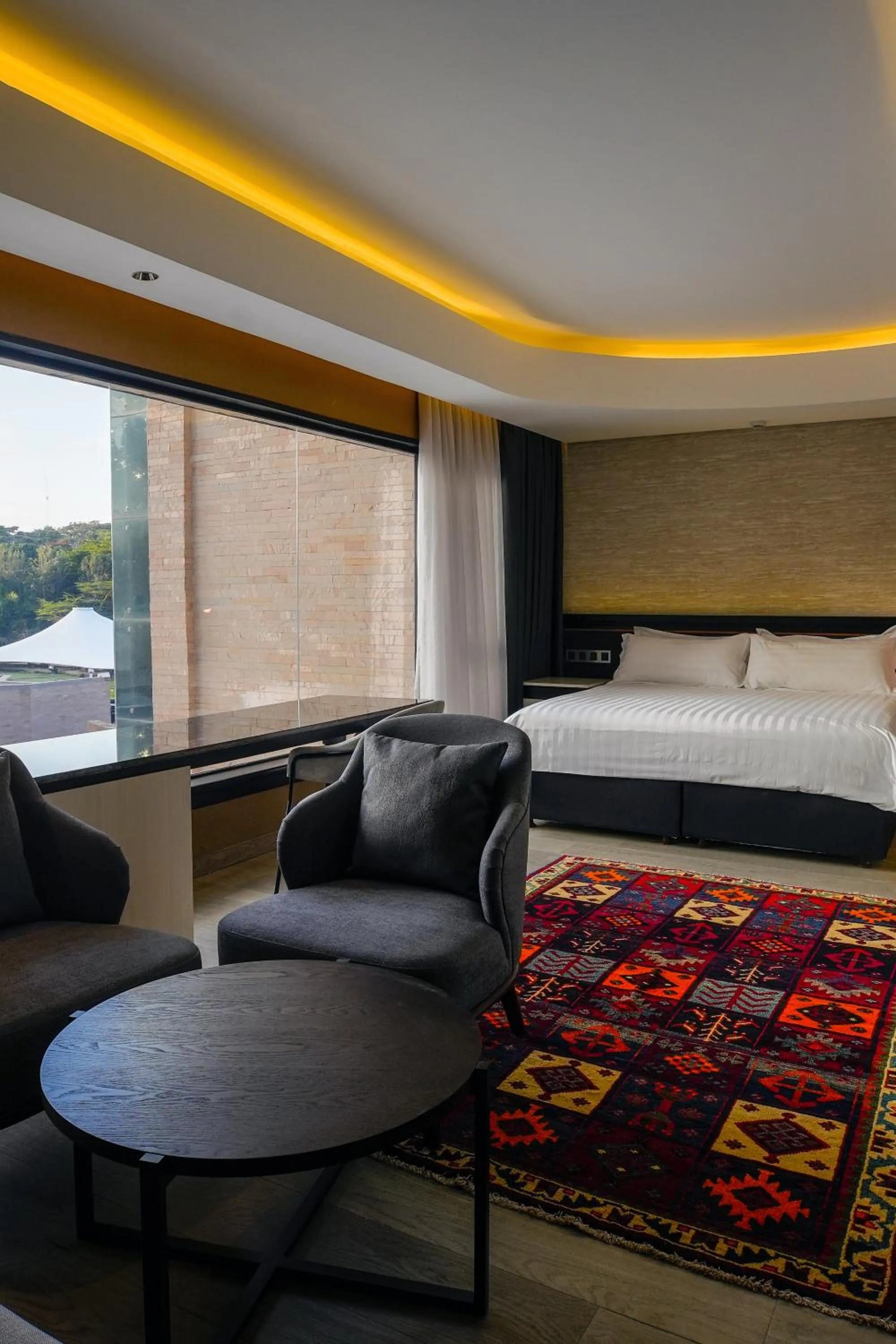 Seating area, Bed in Tribe Hotel, Nairobi, a Member of Design Hotels