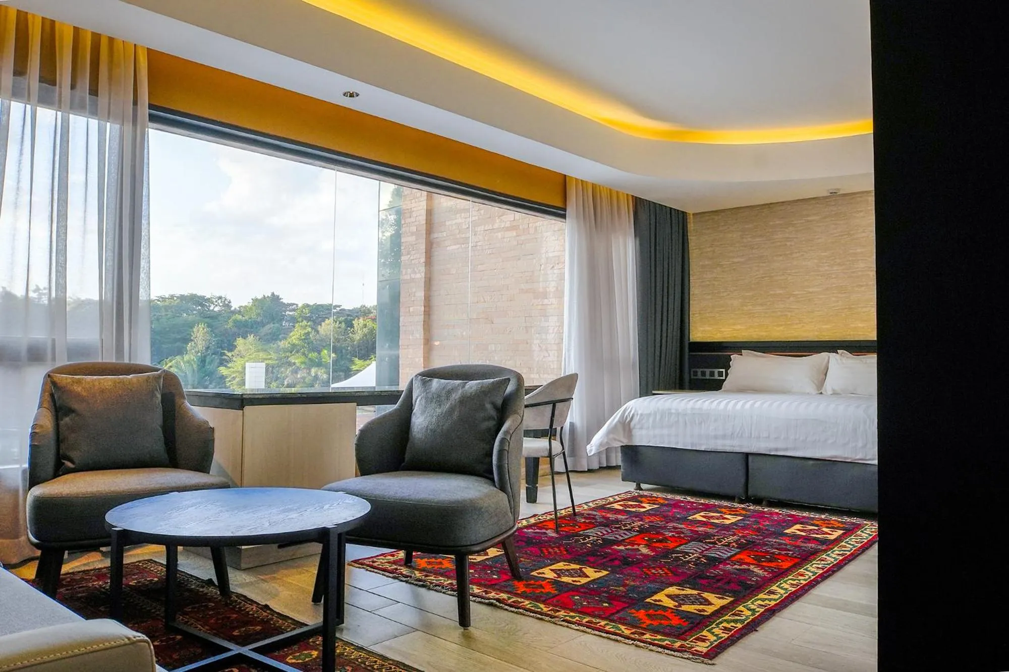 Seating area, Bed in Tribe Hotel, Nairobi, a Member of Design Hotels