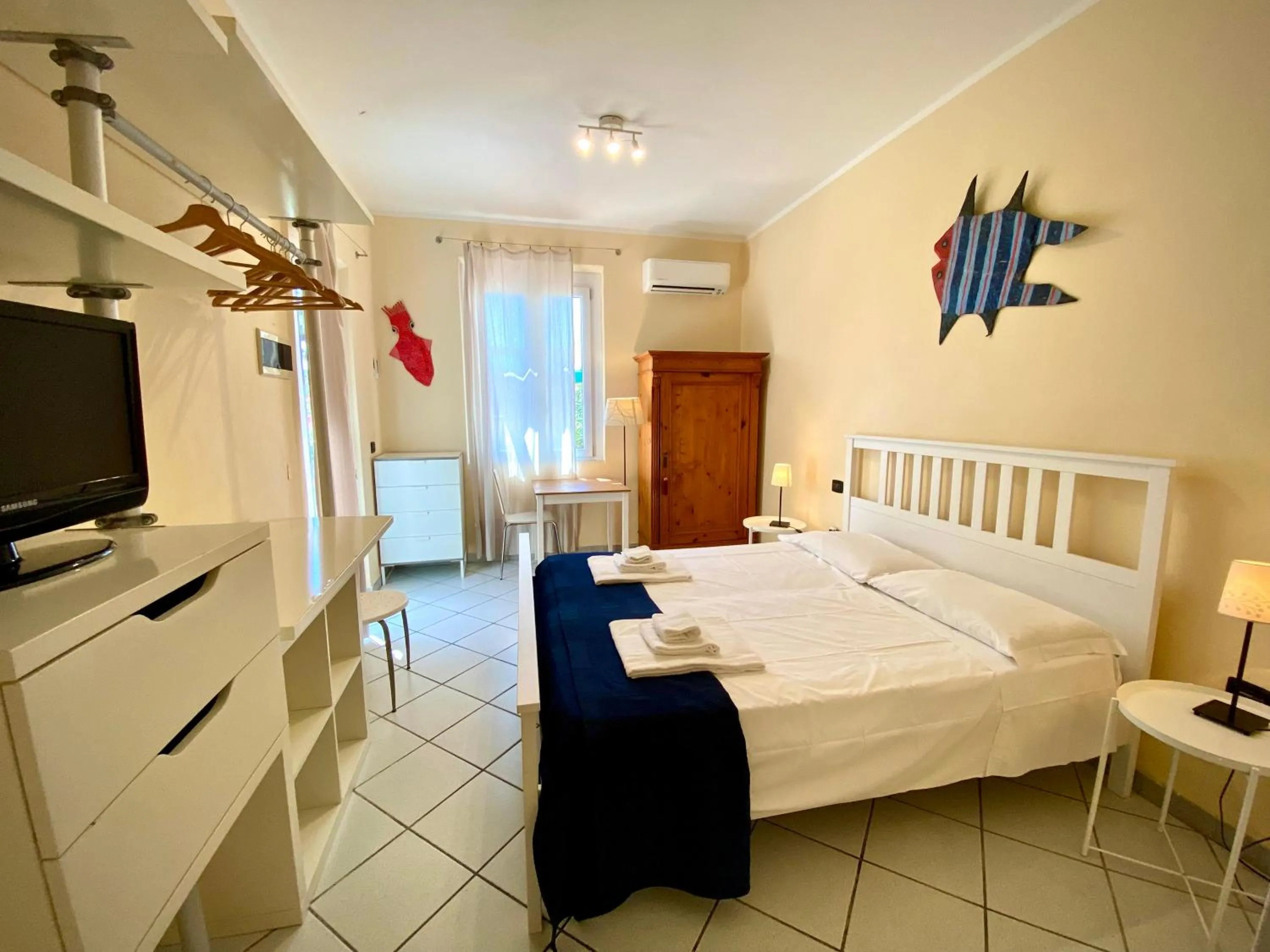 Bed in Belvedere Residenza Mediterranea