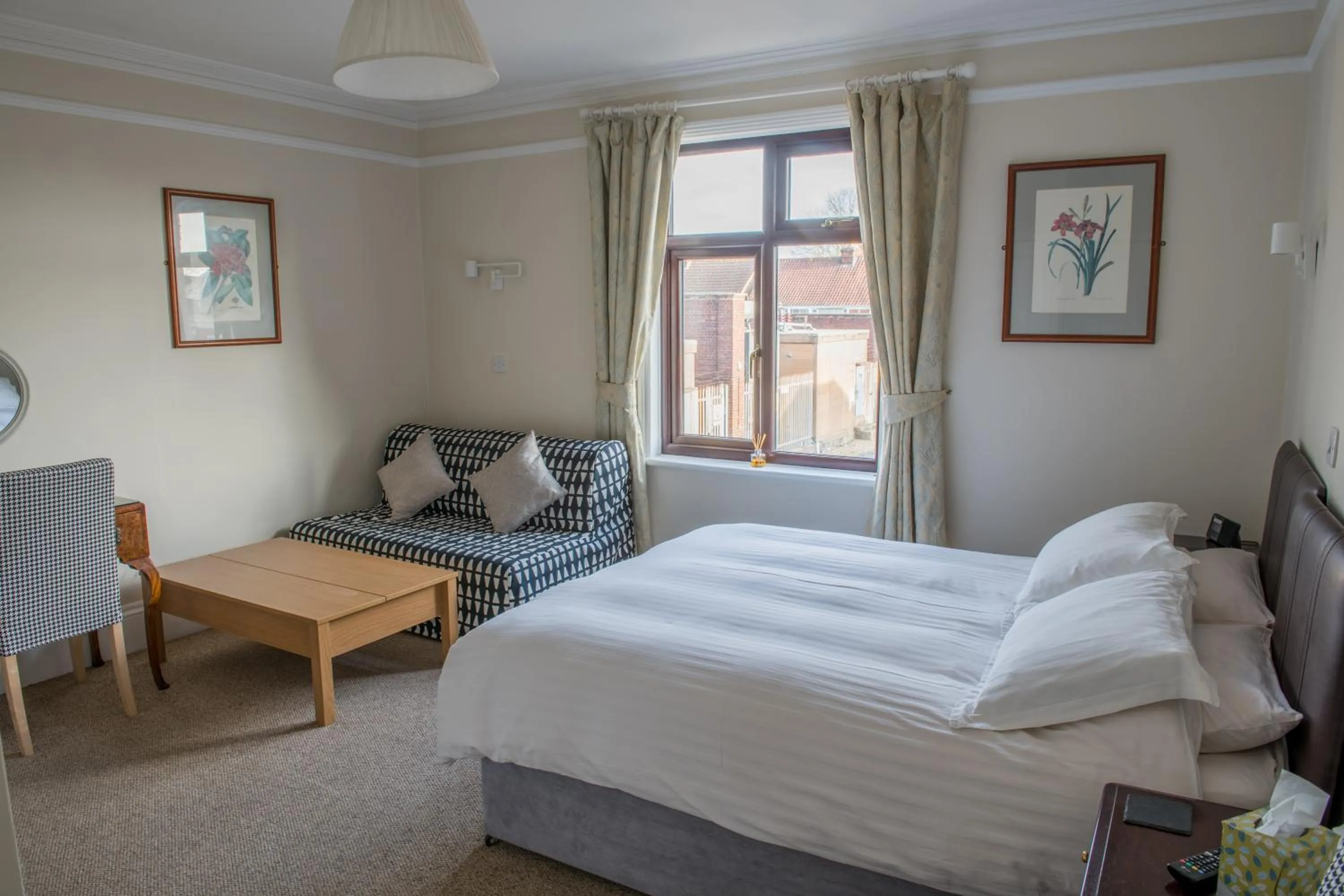 Bed in Toothbrush Rooms at Lattice Lodge - Guest Kitchen & EV Recharging