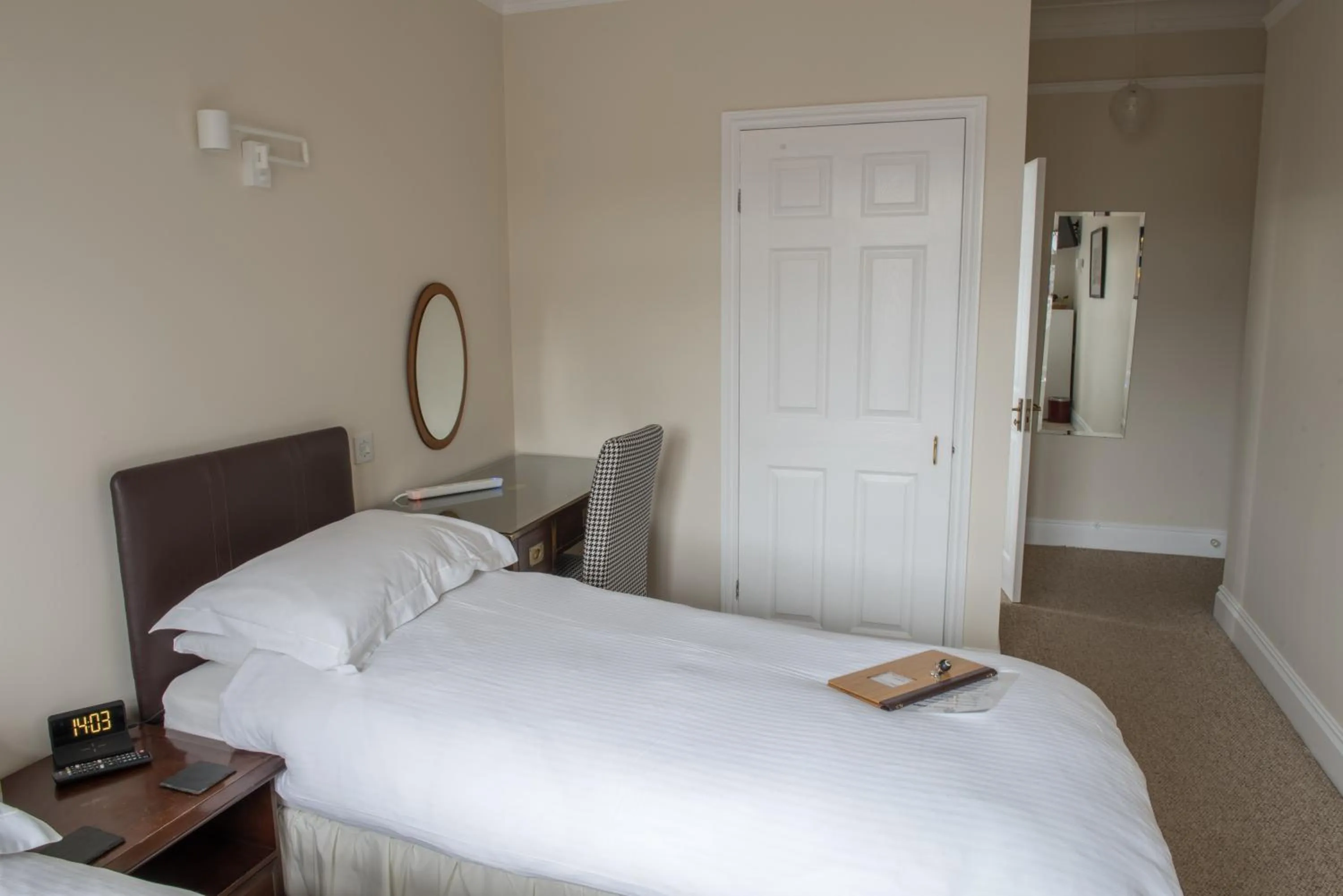 Bed in Toothbrush Rooms at Lattice Lodge - Guest Kitchen & EV Recharging