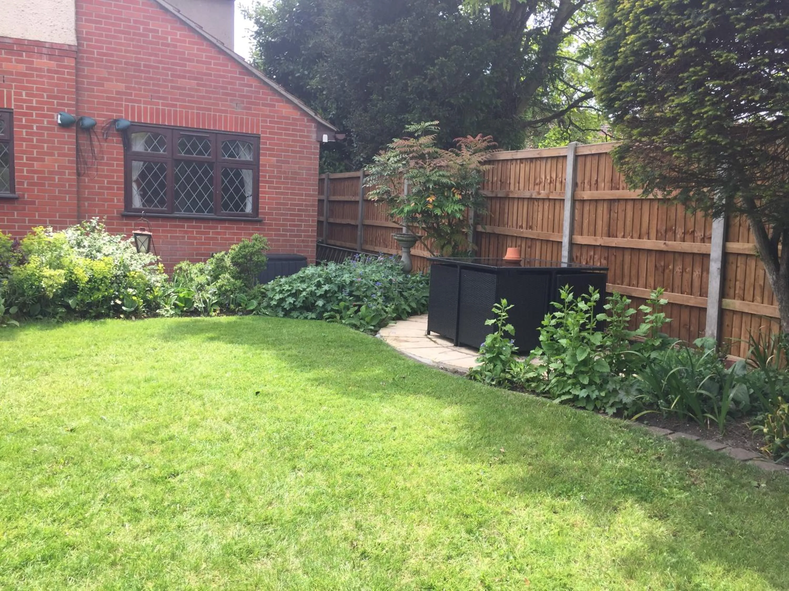 Garden in Toothbrush Rooms at Lattice Lodge - Guest Kitchen & EV Recharging