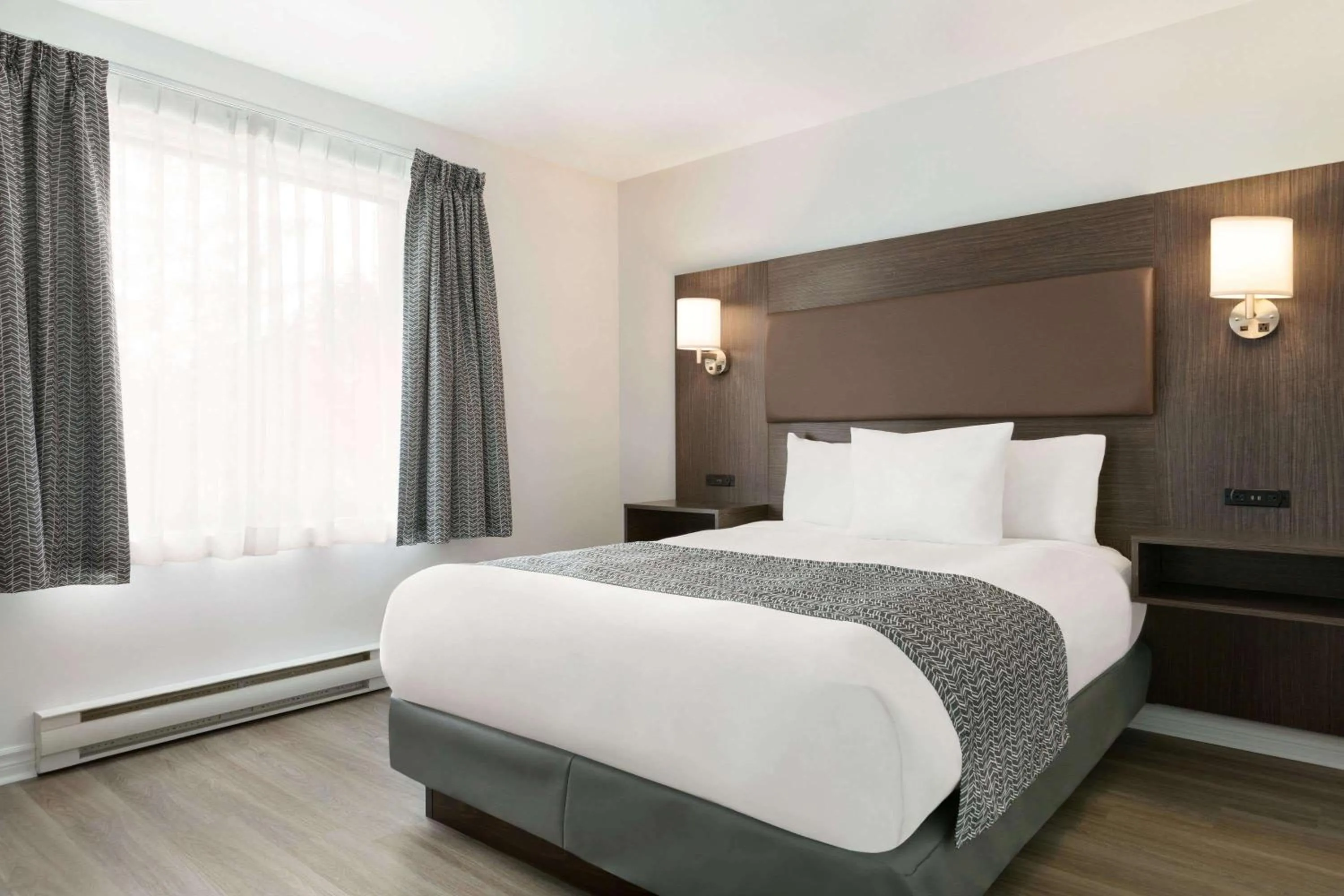 Photo of the whole room, Bed in Travelodge by Wyndham Rigaud