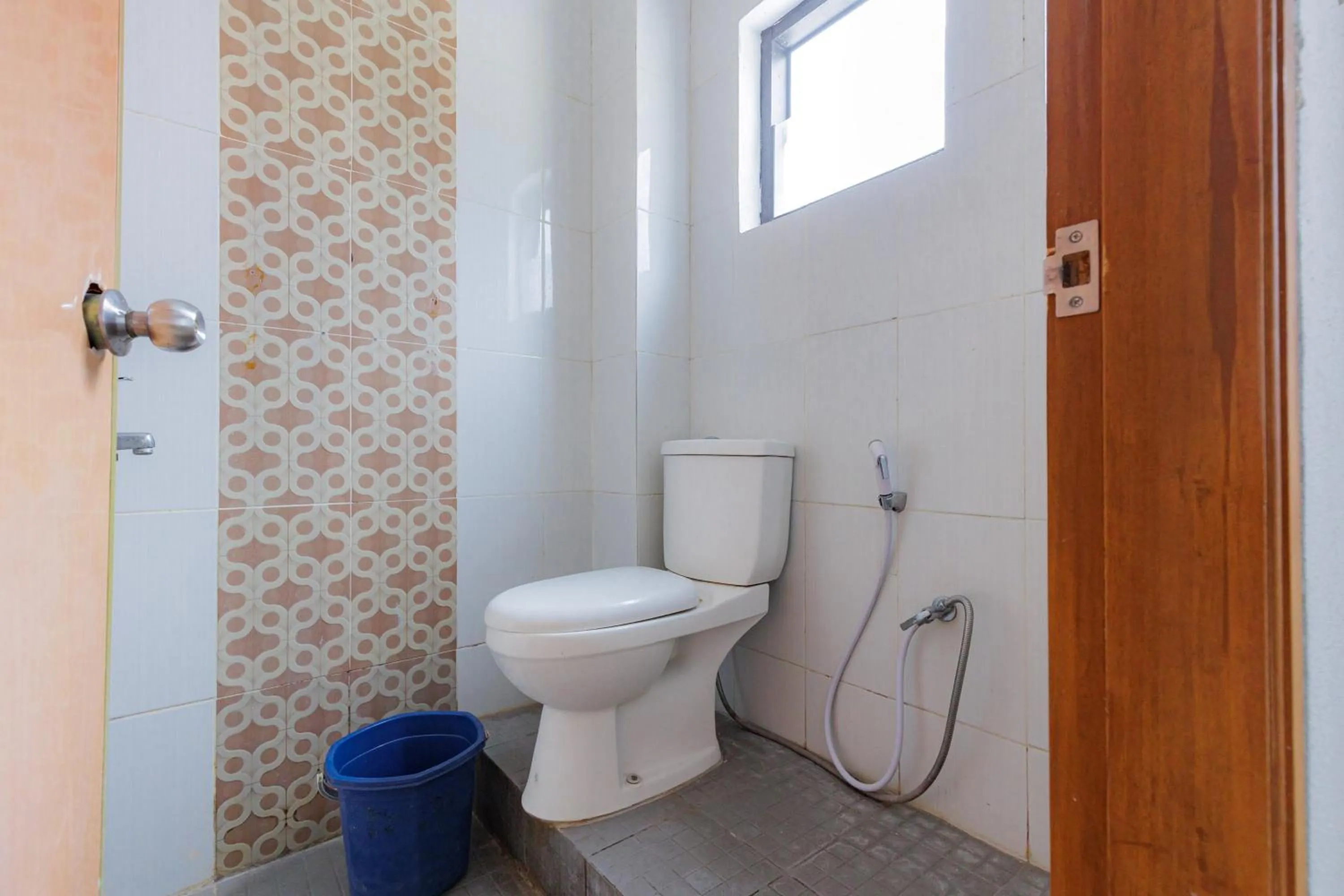 Bathroom in RedDoorz near Taman Rekreasi Selecta