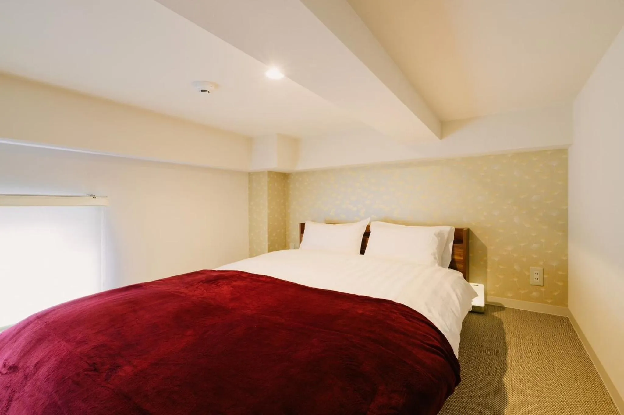 Bed in TEN APARTMENT HOTEL