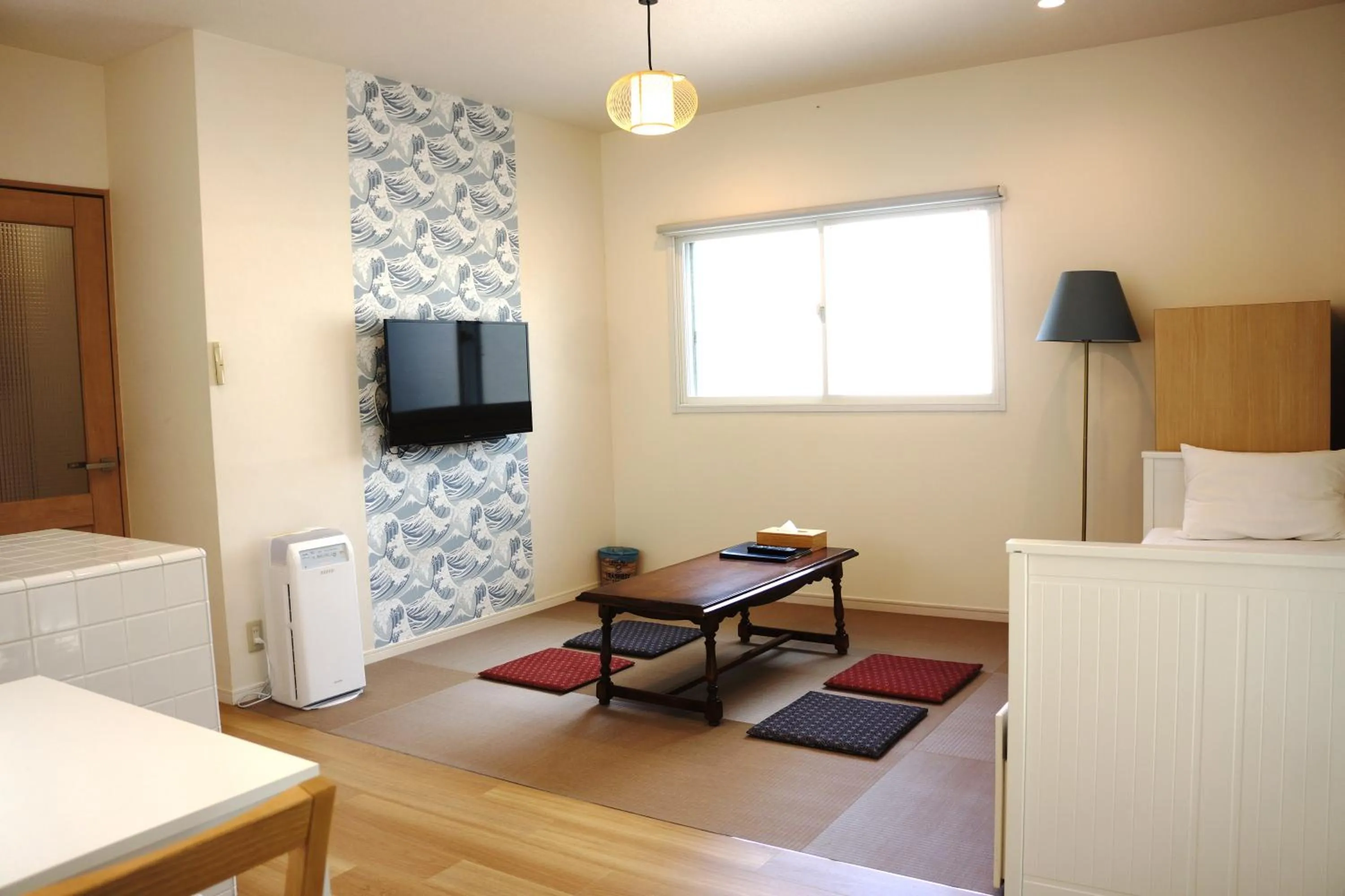 Living room, Bed in TEN APARTMENT HOTEL