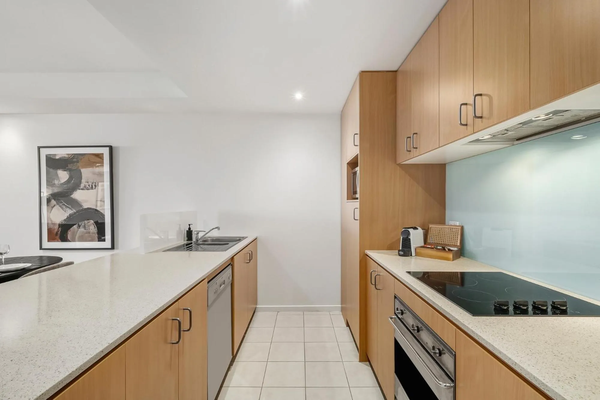 kitchen in Nolo Apartments Lonsdale St