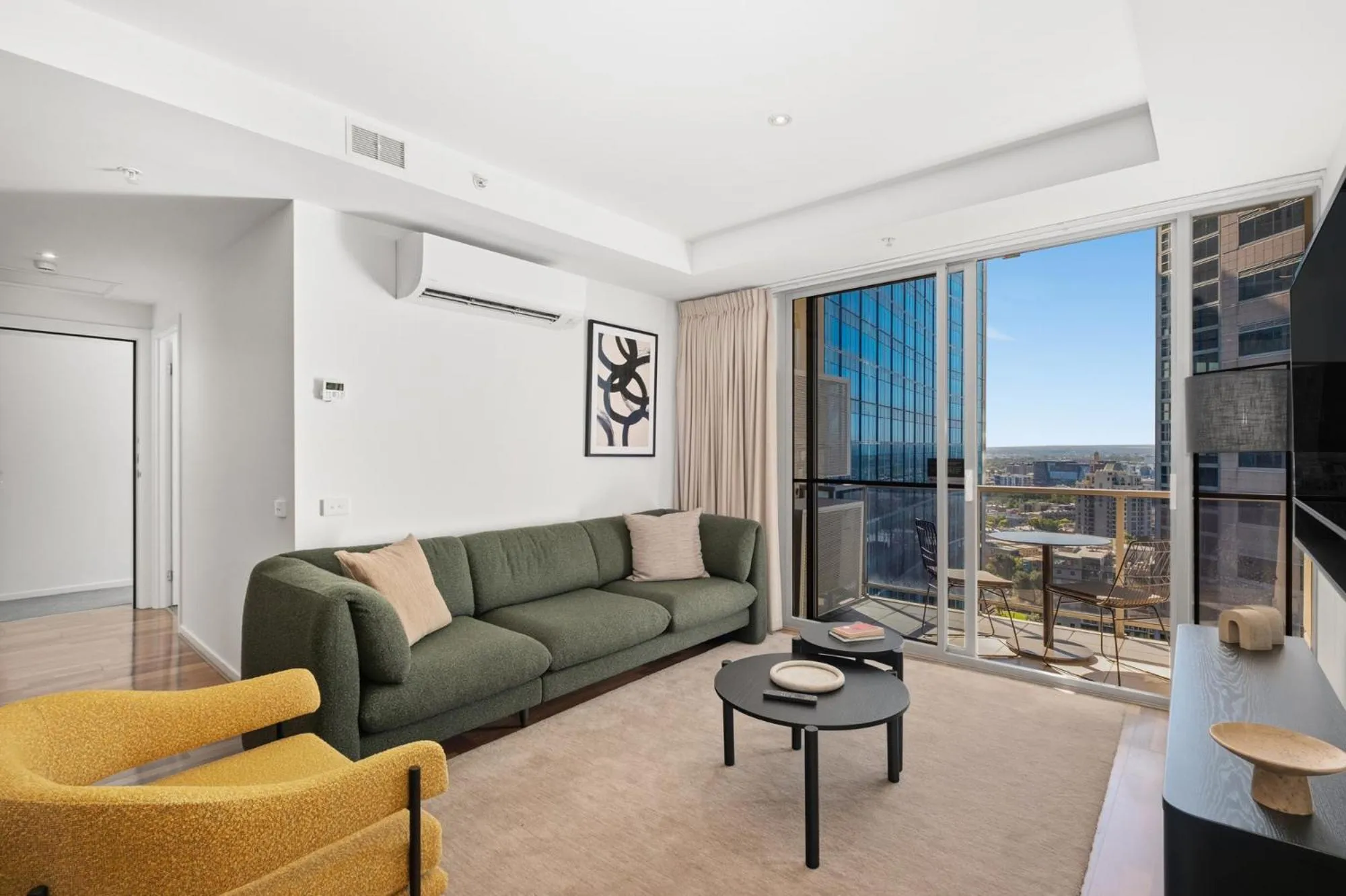 Living room in Nolo Apartments Lonsdale St