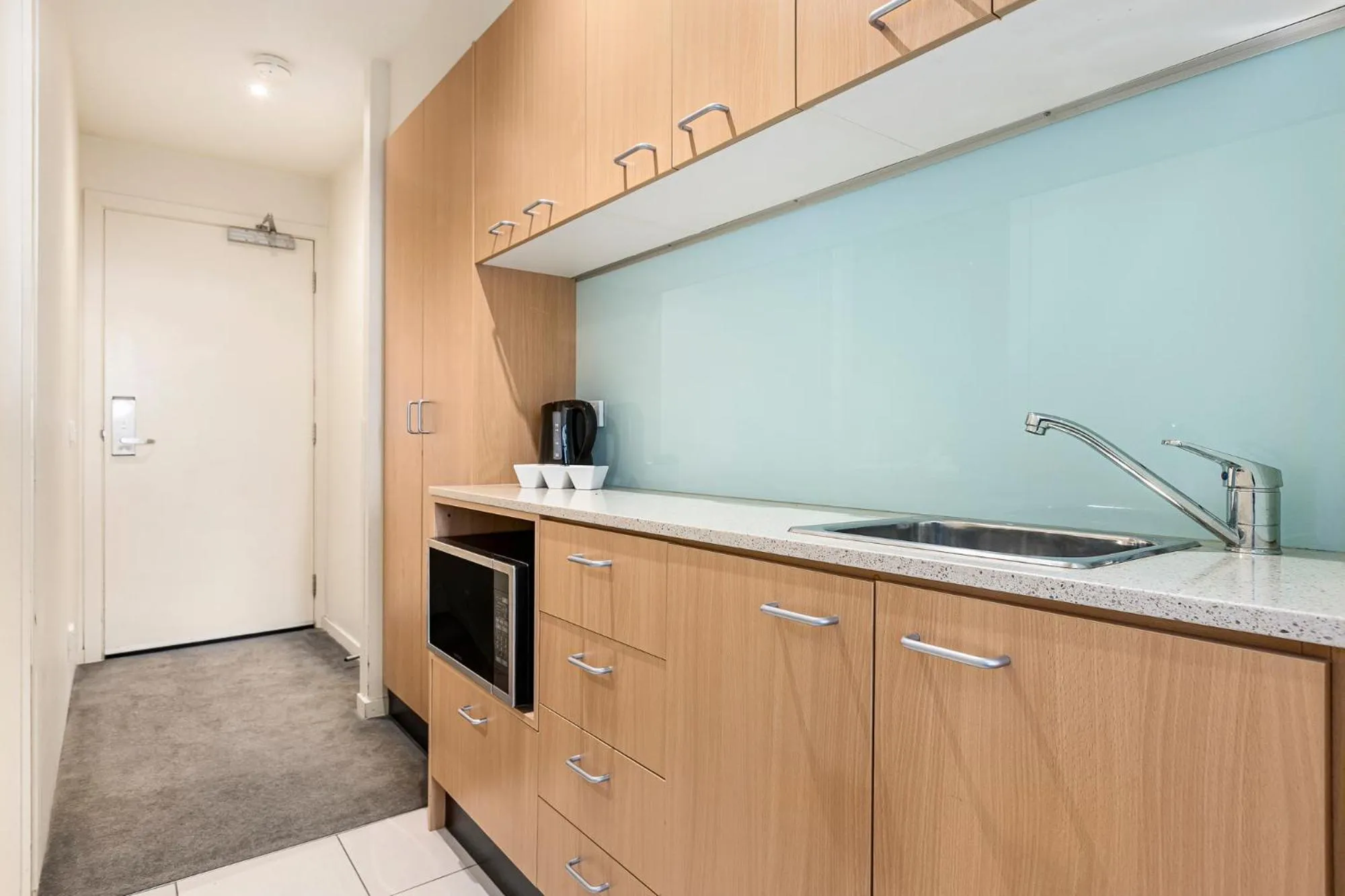 Kitchen or kitchenette in Nolo Apartments Lonsdale St