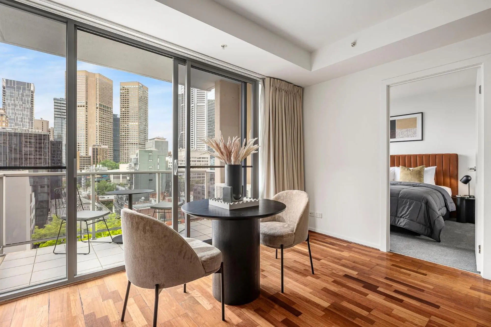 Dining area, Bed in Nolo Apartments Lonsdale St