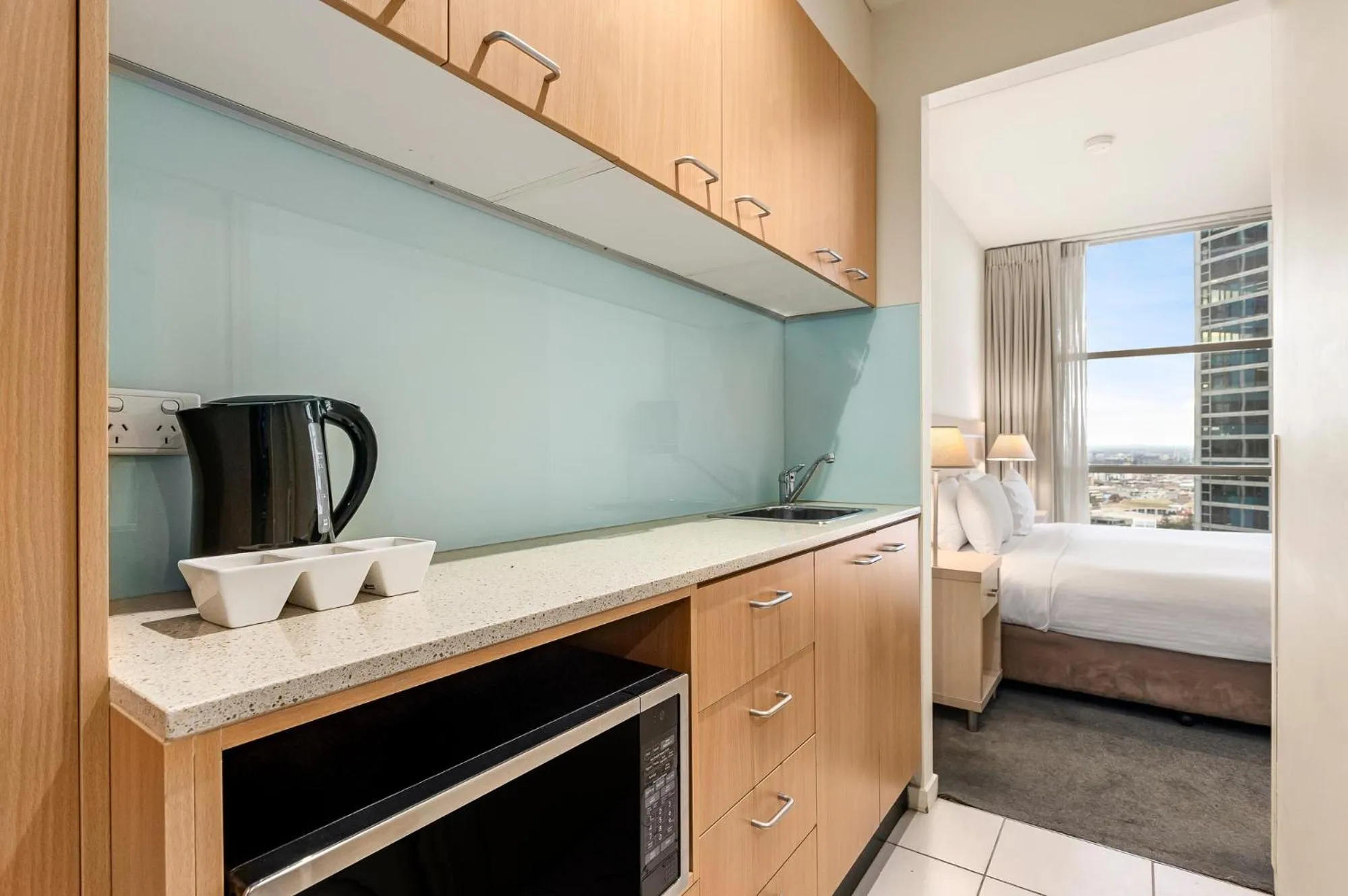 Kitchen or kitchenette, Bed in Nolo Apartments Lonsdale St