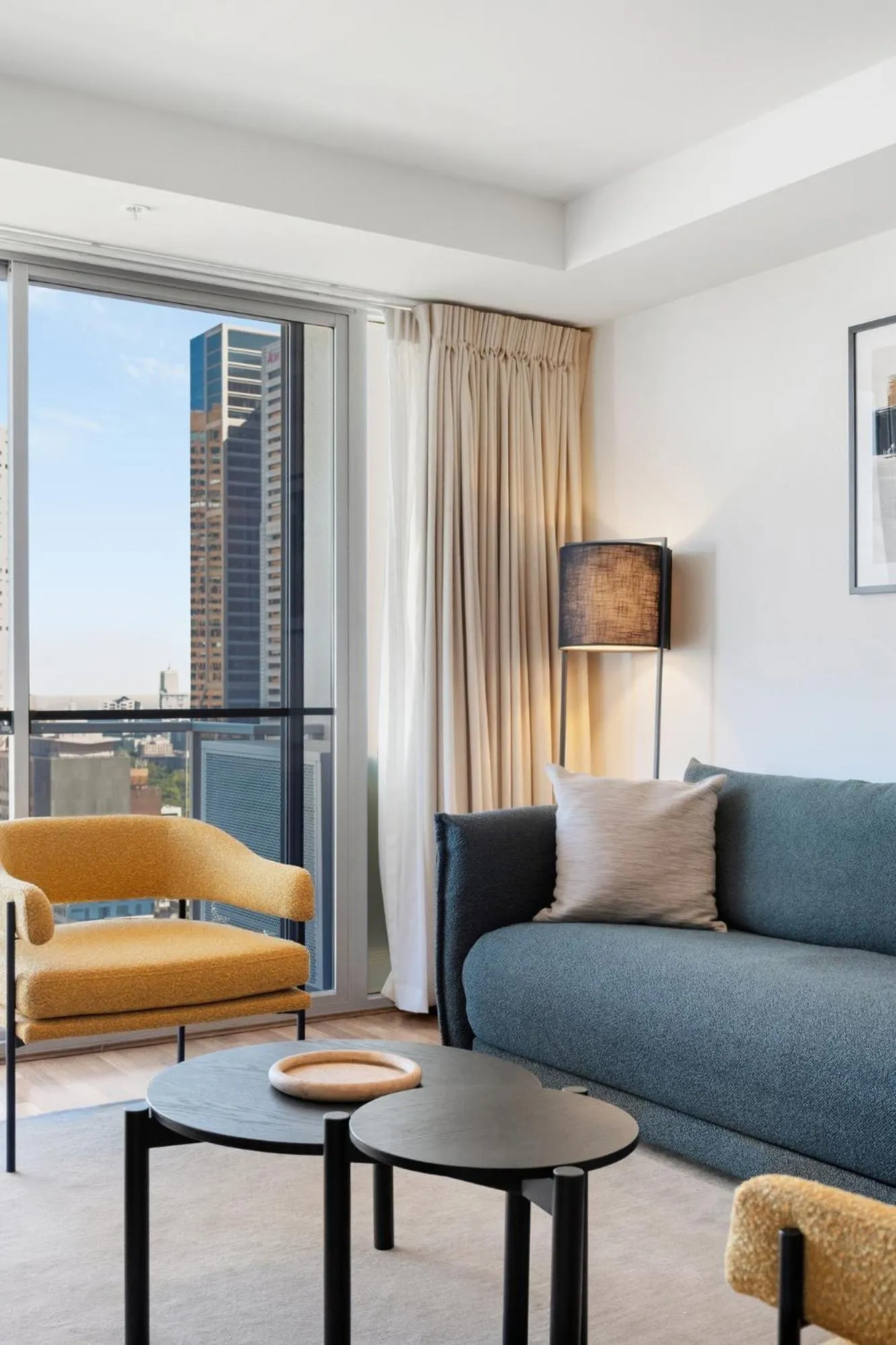 Living room in Nolo Apartments Lonsdale St