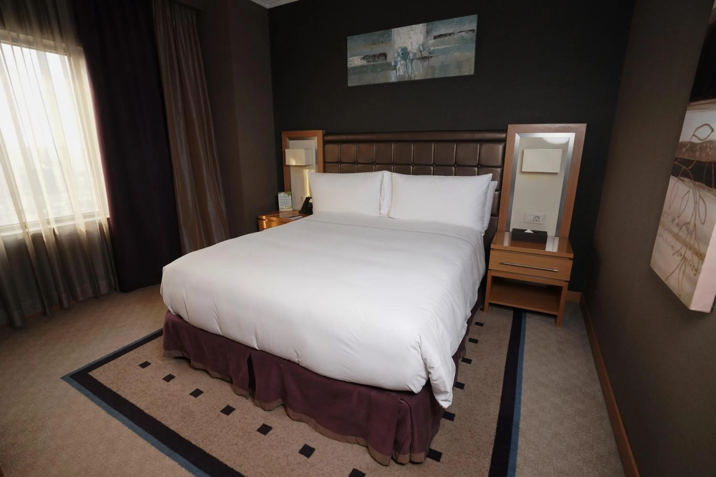 Bed in Divan Erbil Hotel