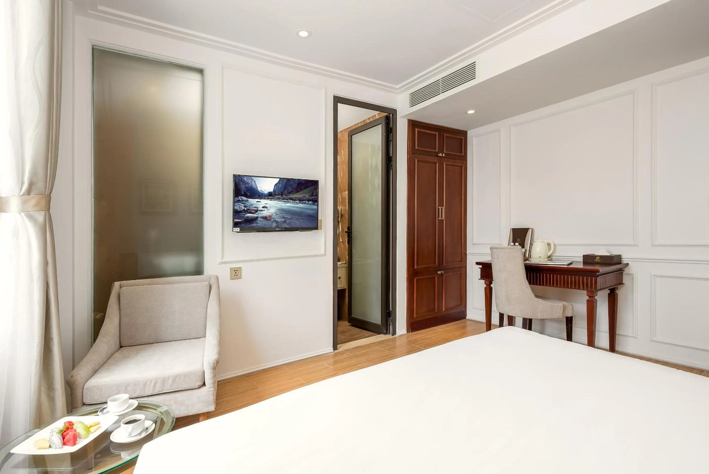 Seating area, Bed in Menora Grand Da Nang