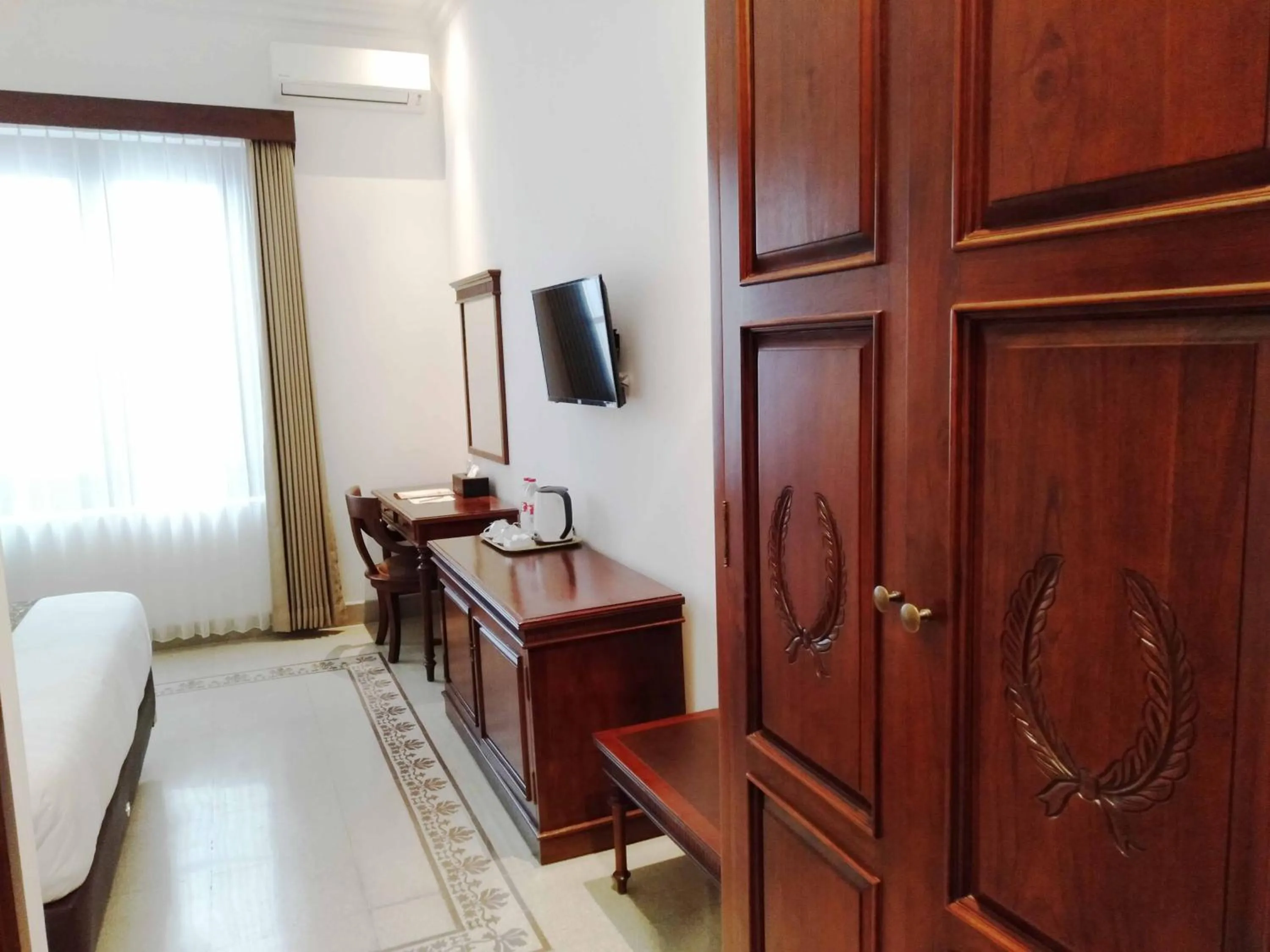 TV and multimedia in Daroessalam Syariah Heritage Hotel