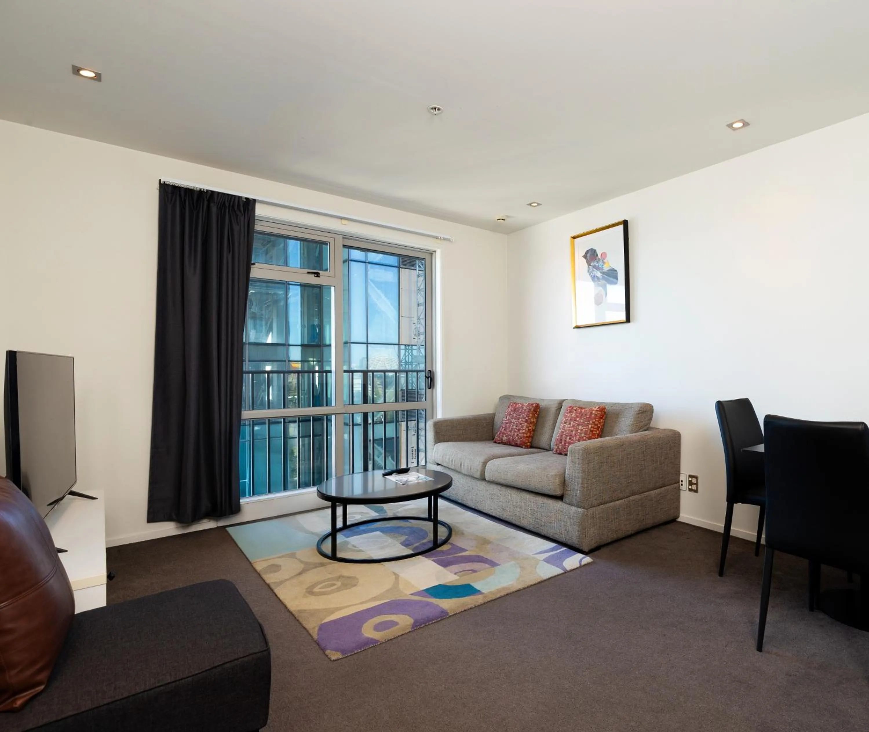 Living room in Auckland Harbour Suites