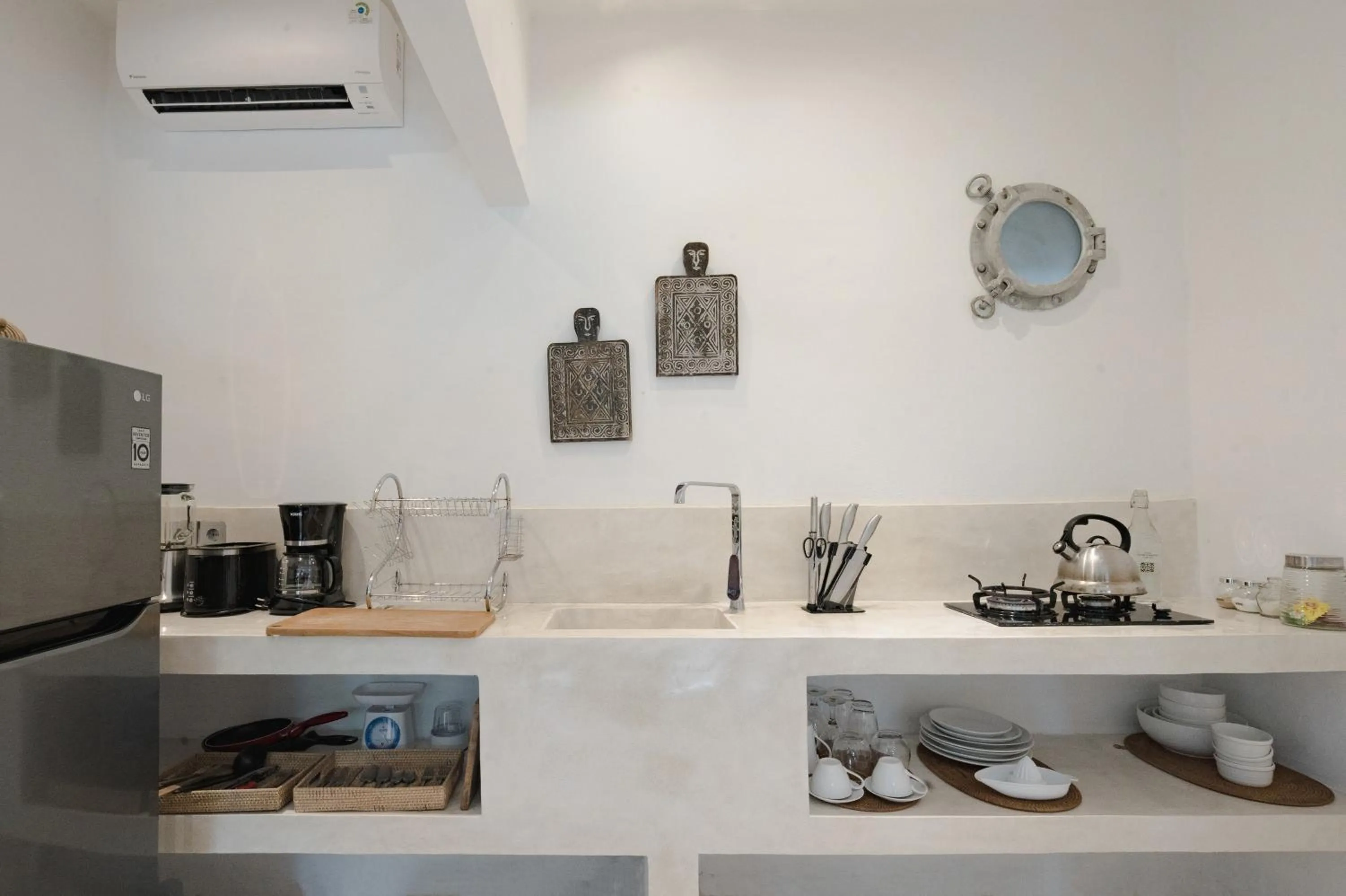 Kitchen or kitchenette in The Apartments Ubud