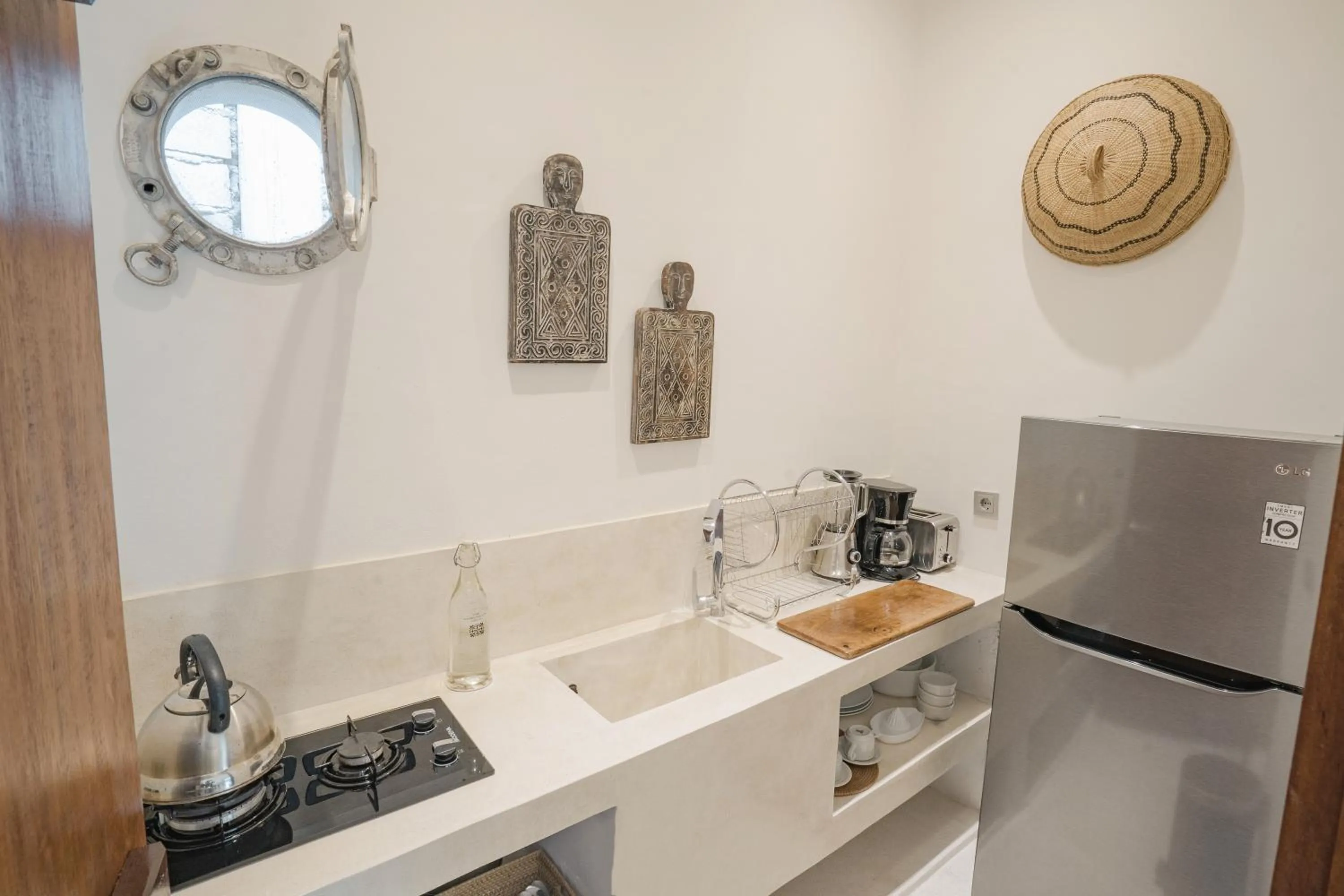 Kitchen or kitchenette in The Apartments Ubud