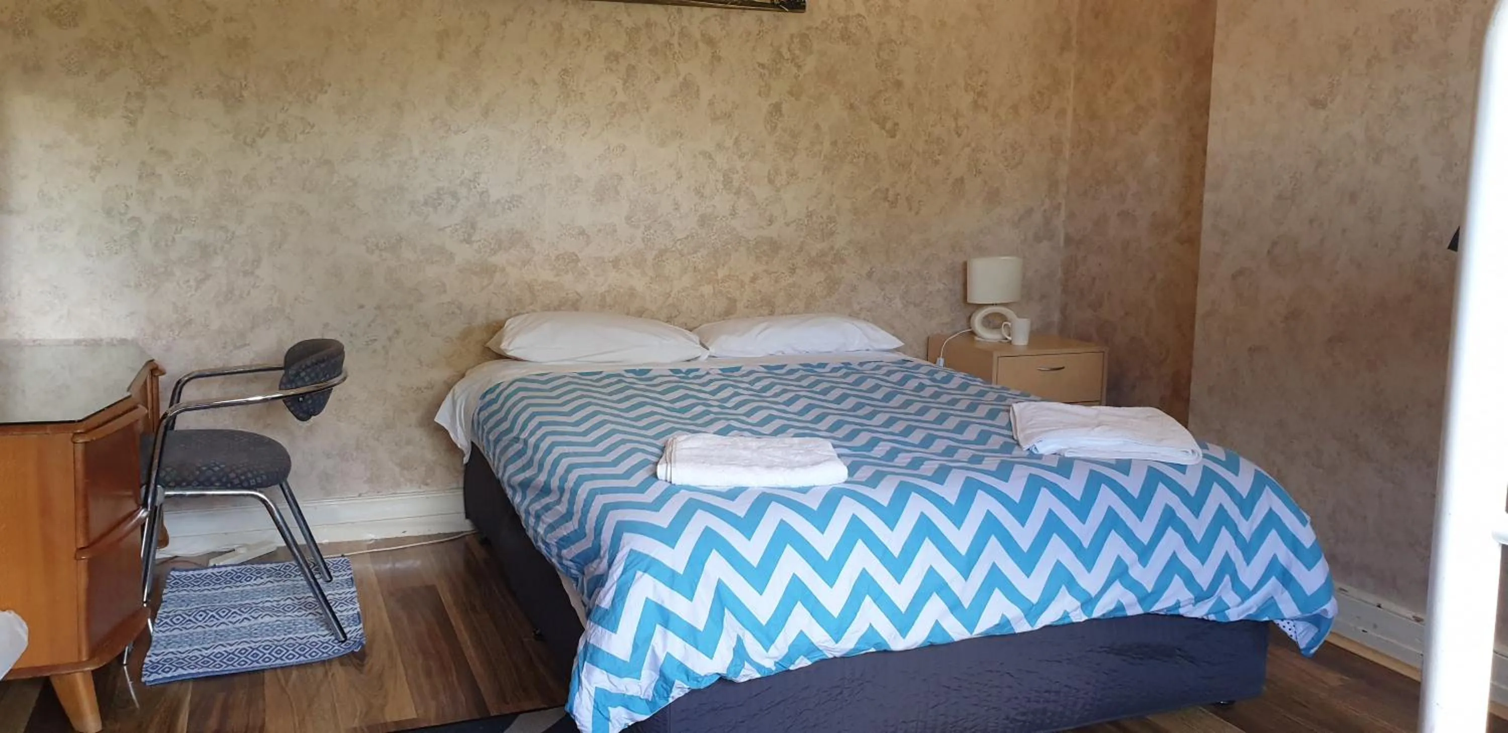 Bed in The Eastern Hotel Accommodation