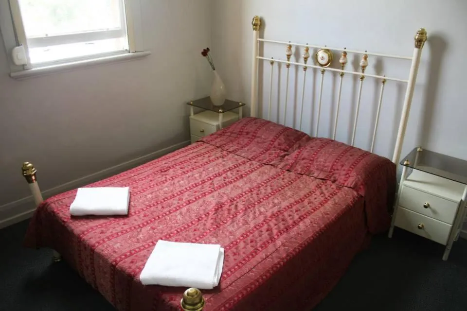 Bed in The Eastern Hotel Accommodation