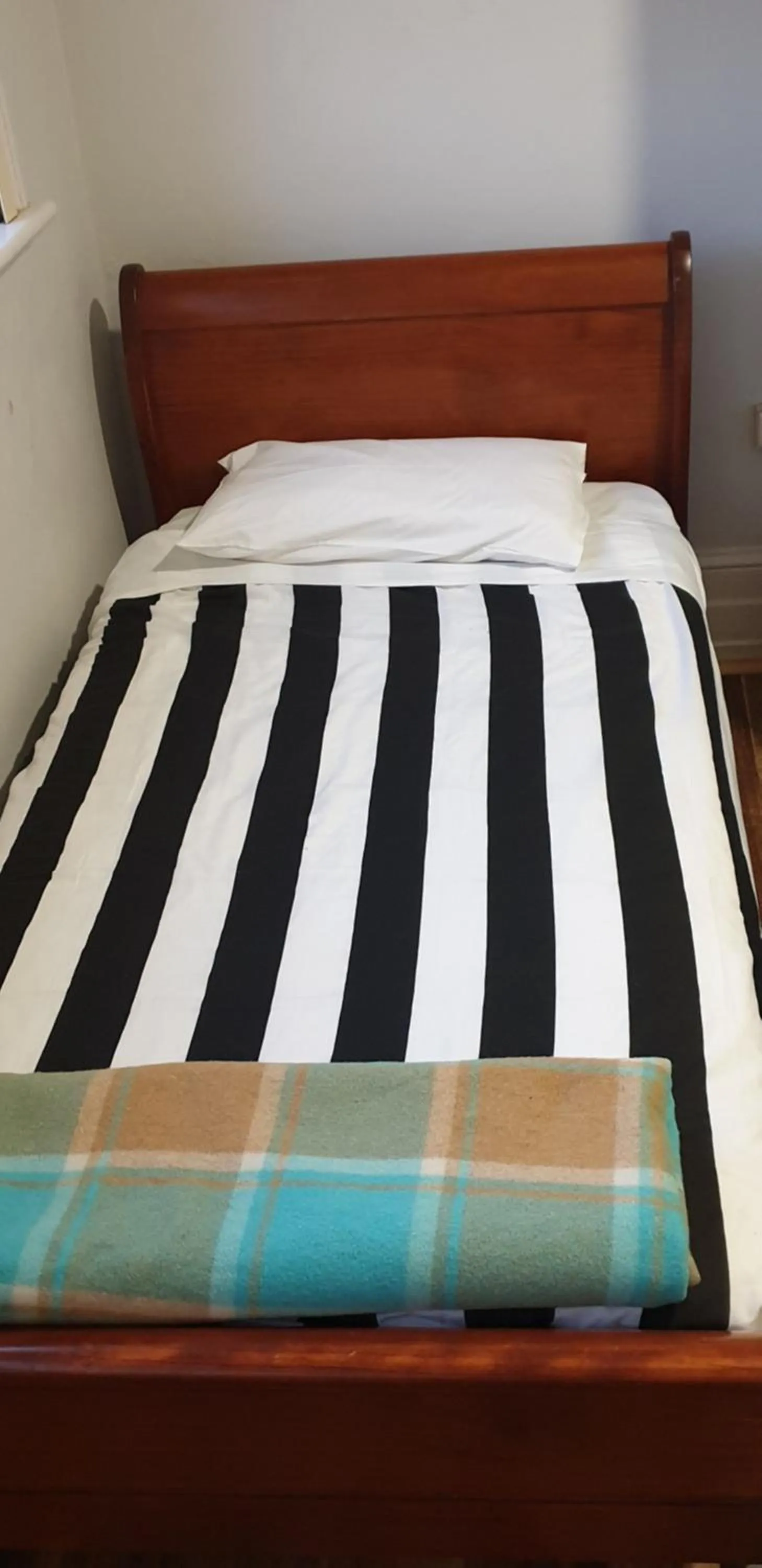 Bed in The Eastern Hotel Accommodation