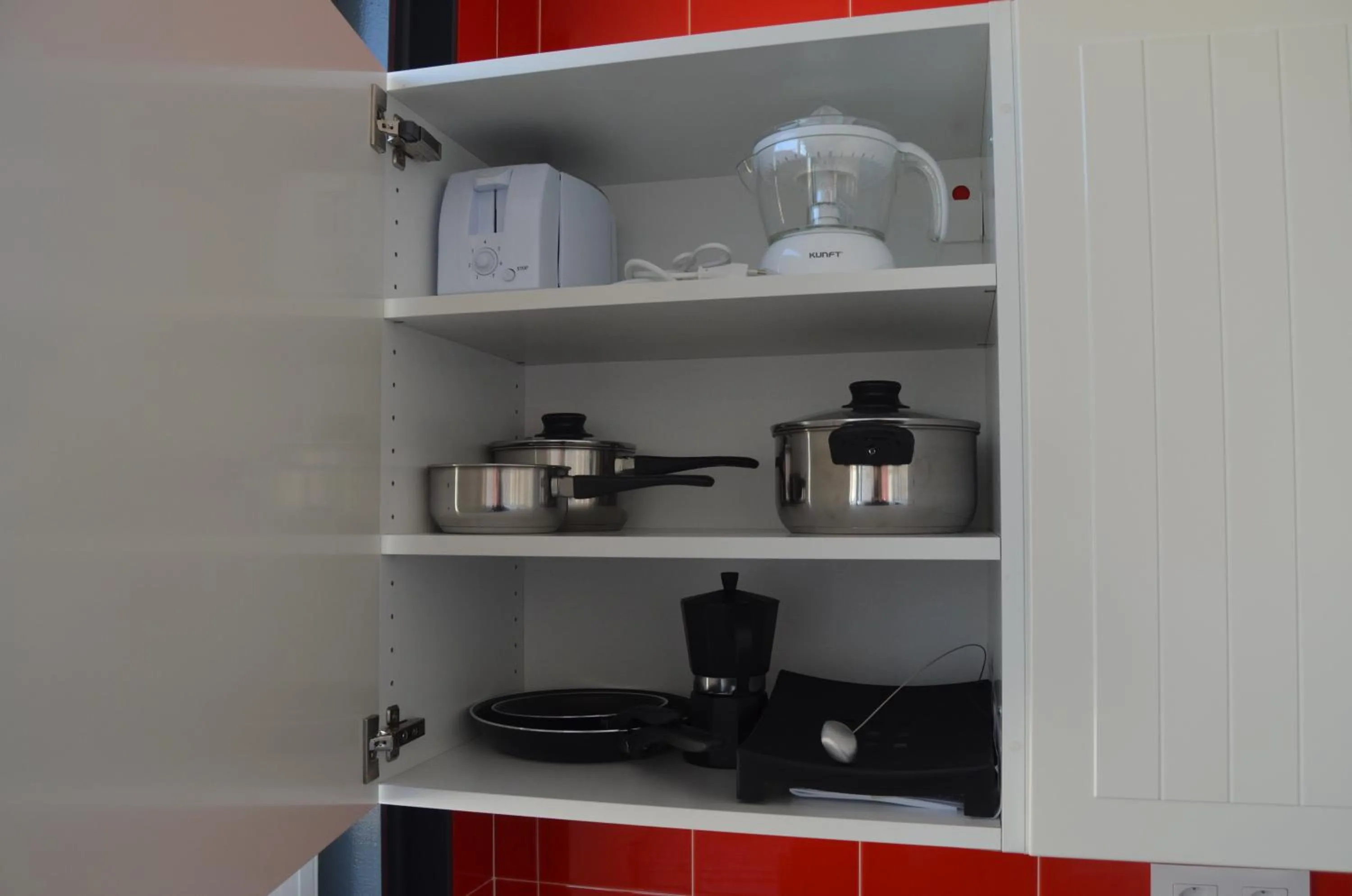 Kitchen or kitchenette in Apartamentos Calle Rosario