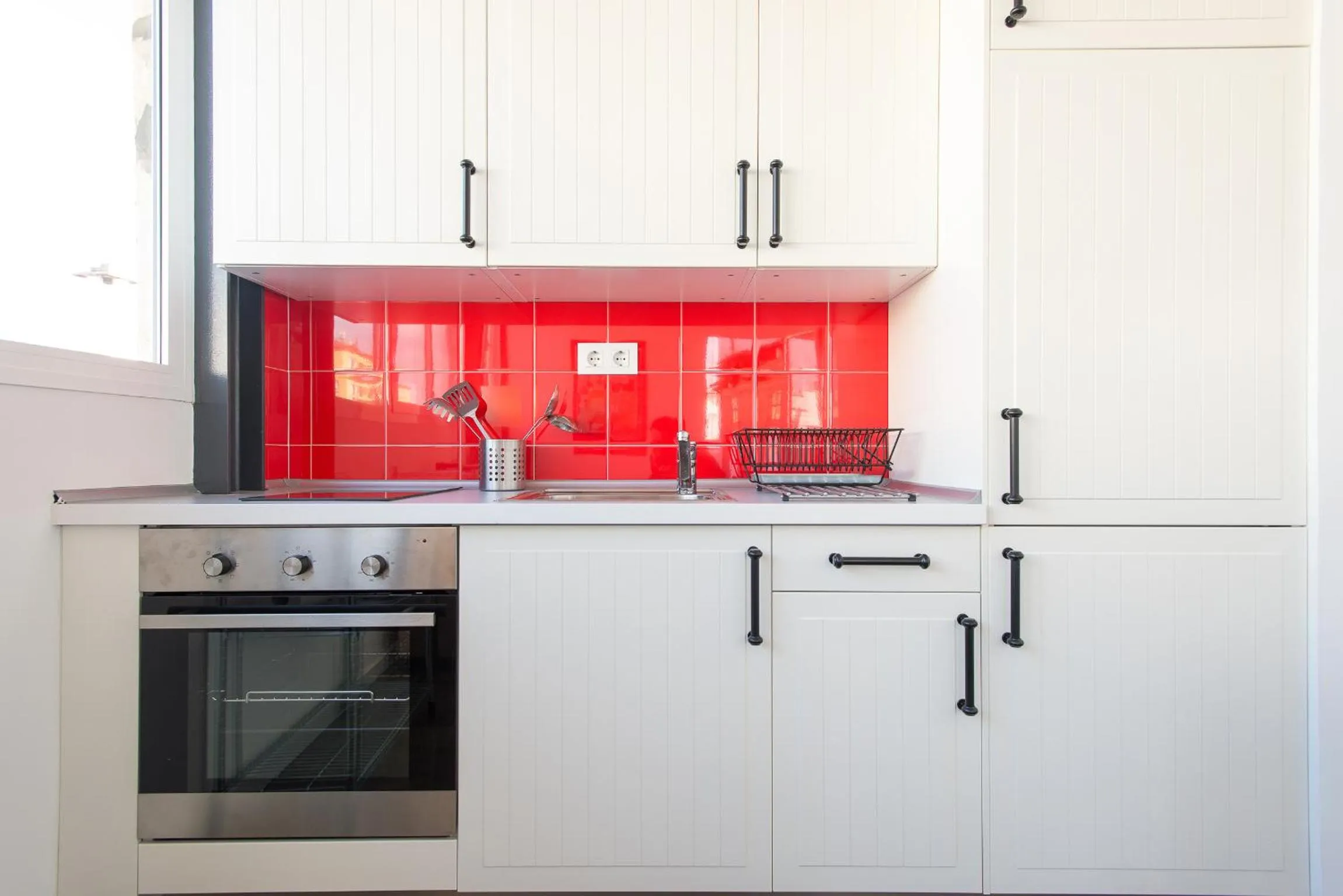 Kitchen or kitchenette in Apartamentos Calle Rosario