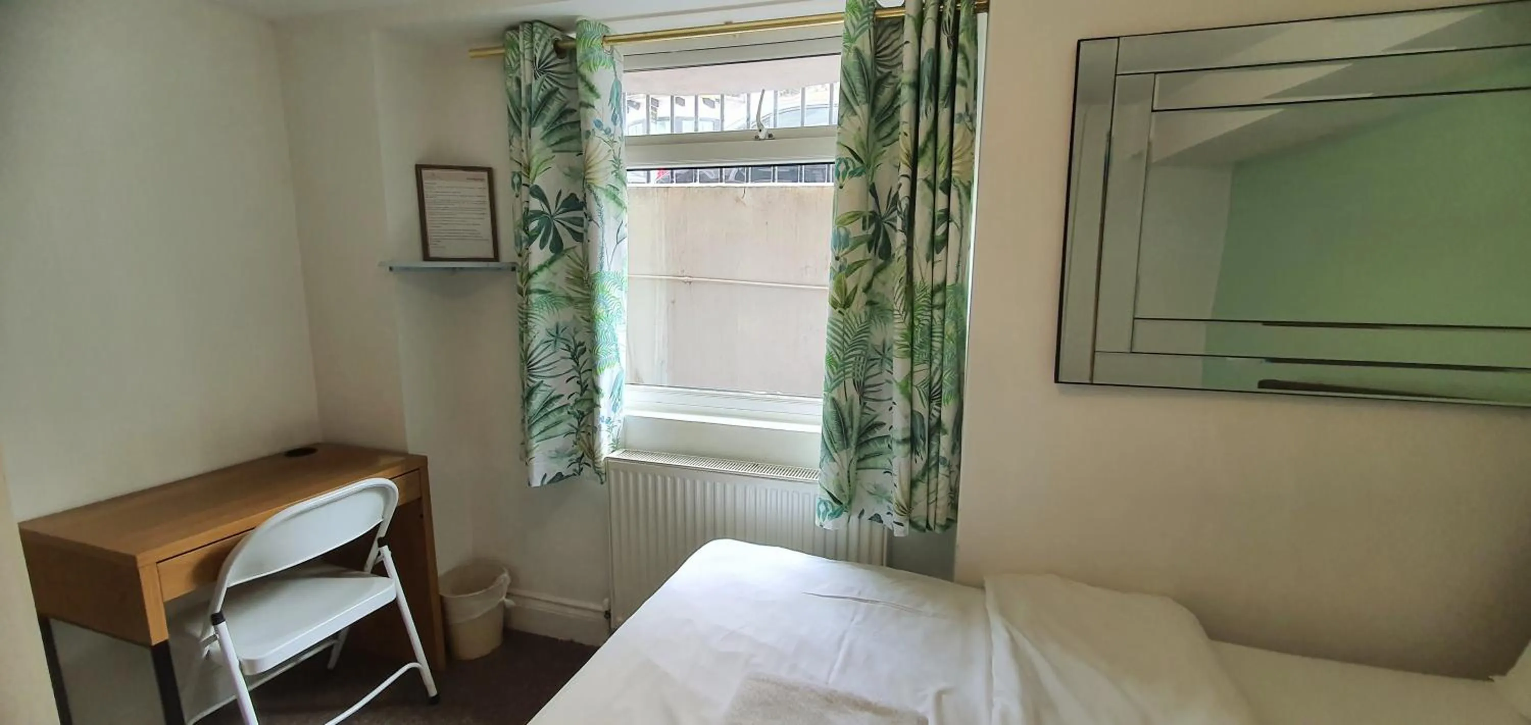 Bed in Grand Pier Guest House