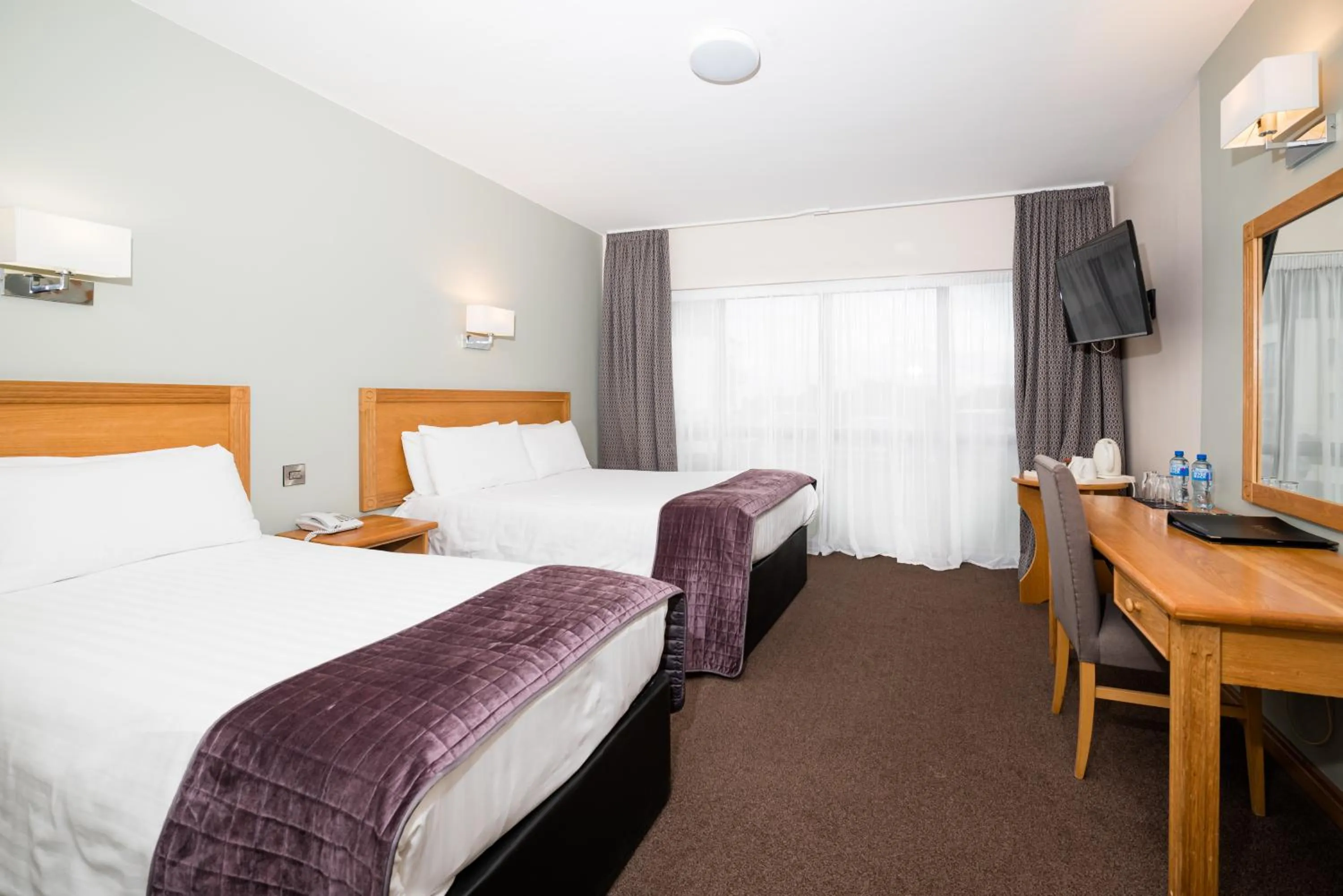 Bed in La Mon Hotel & Country Club