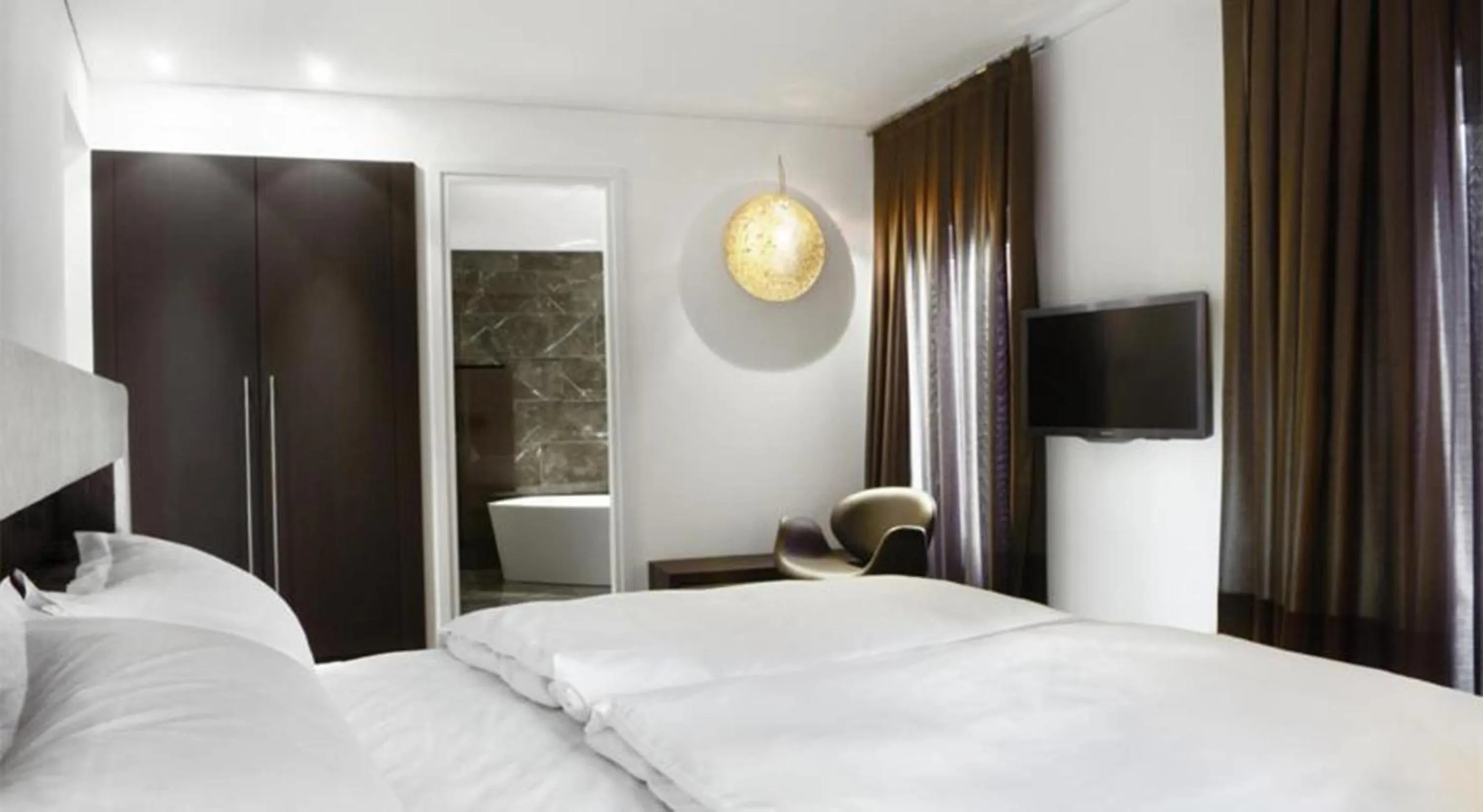 Living room, Bed in Hotel Gabbani