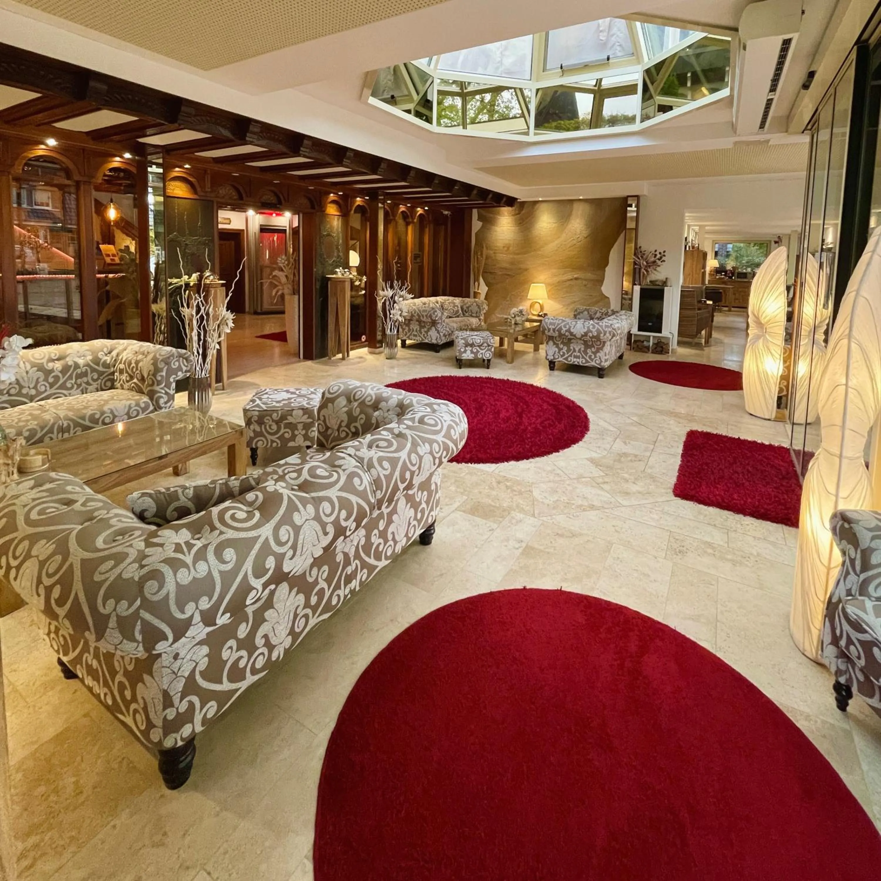 Communal lounge/ TV room in Villa am Park