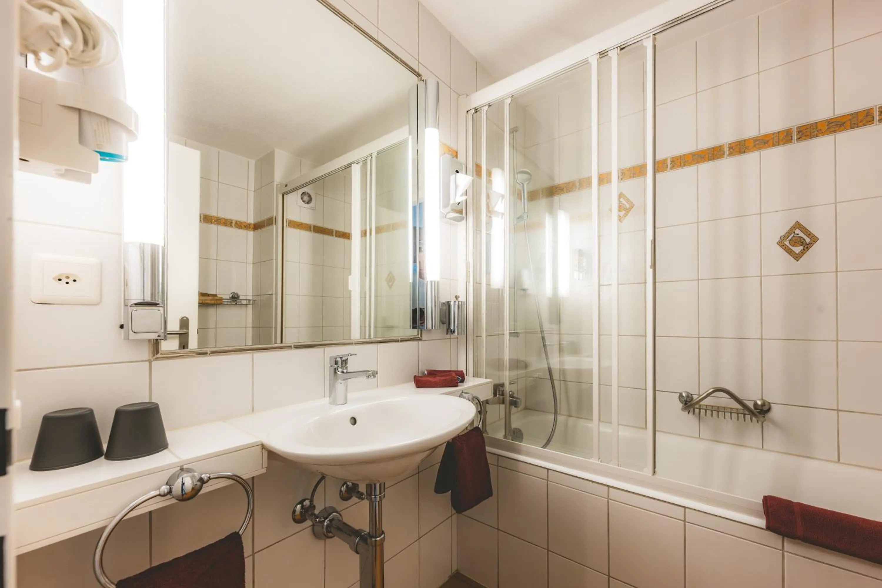 Bathroom in Hotel Alfa Superieur - Leukerbad-Therme