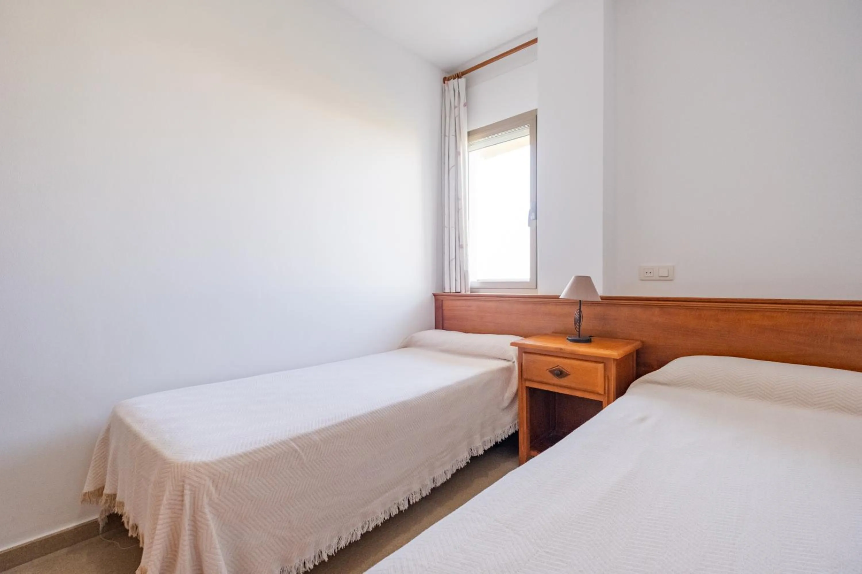 Bed in Apartamentos Proamar