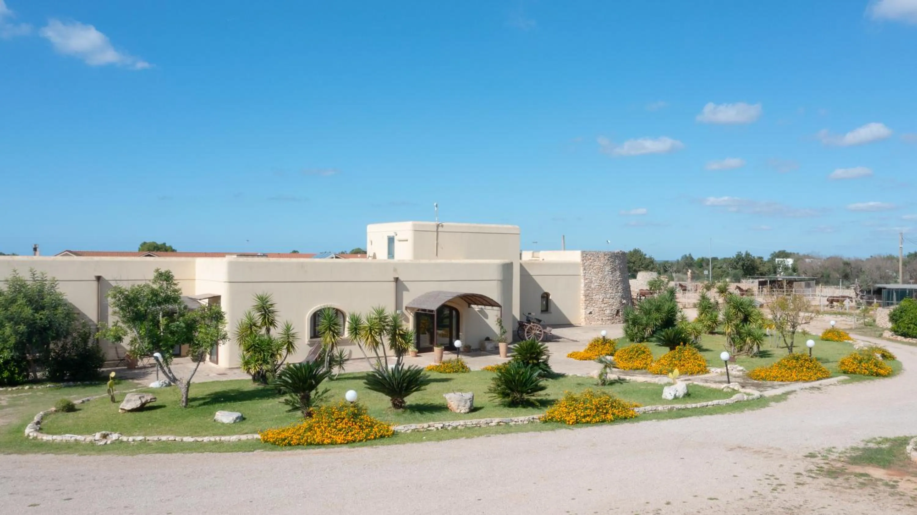 Property building in Delle Rose, Hotel & Horse Riding