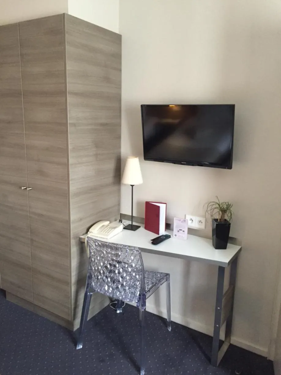 Seating area in Hôtel L'Auberge Alsacienne