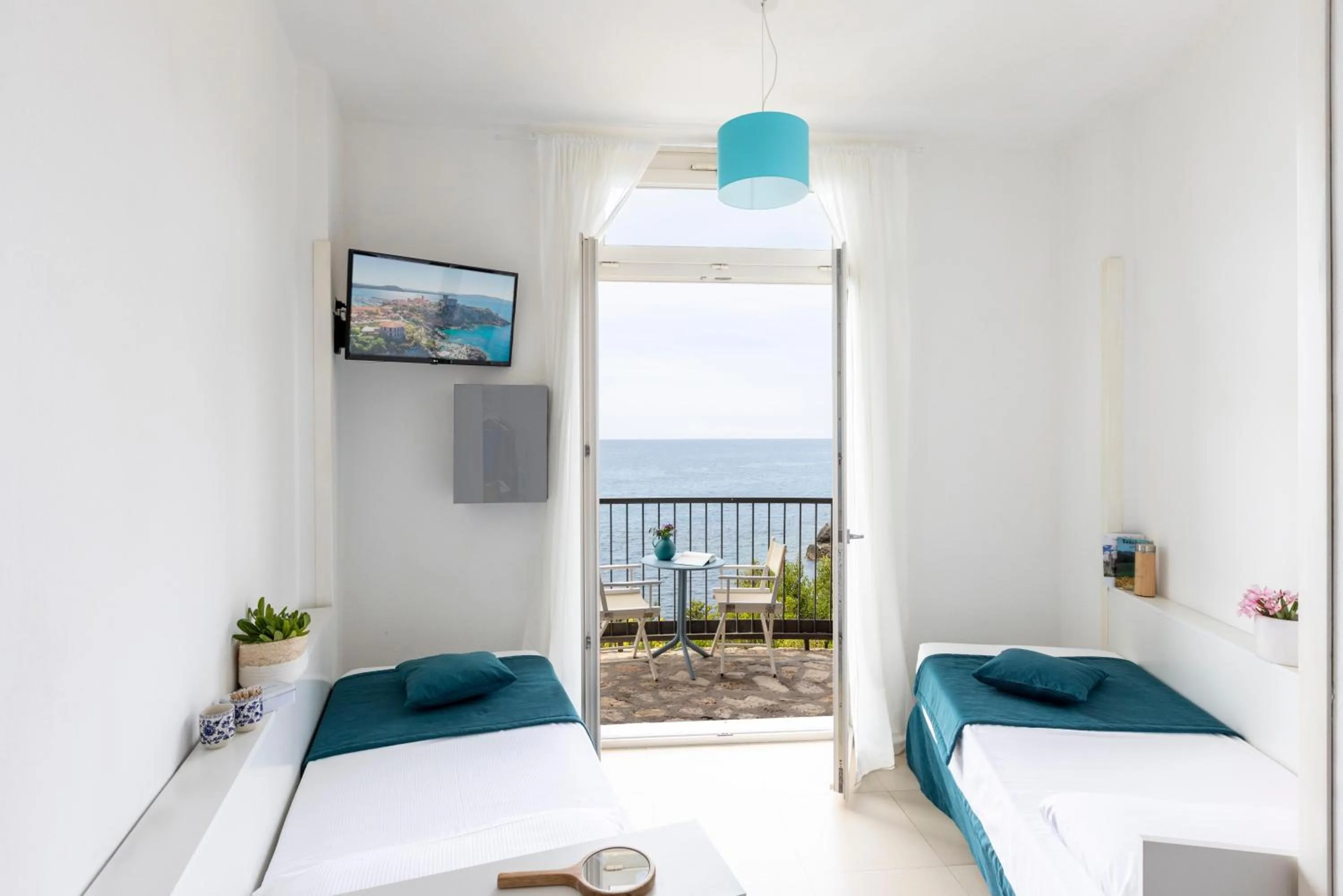 Photo of the whole room in Hotel Capo D'Uomo